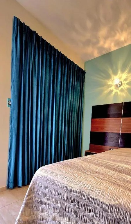 Bed in Hotel RH Boutique Aruba