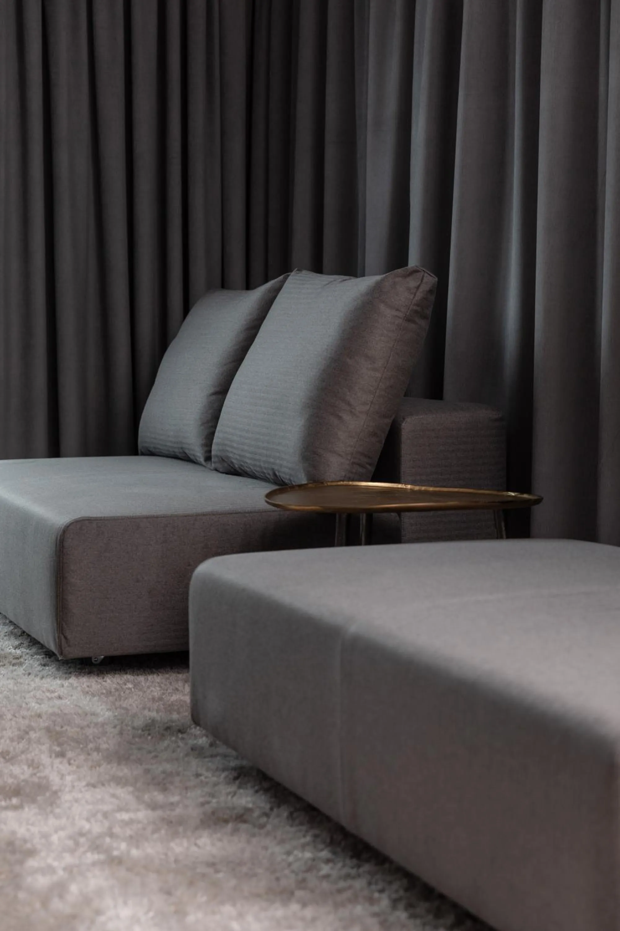 Living room in GOING TRIPLE A apartments WEST