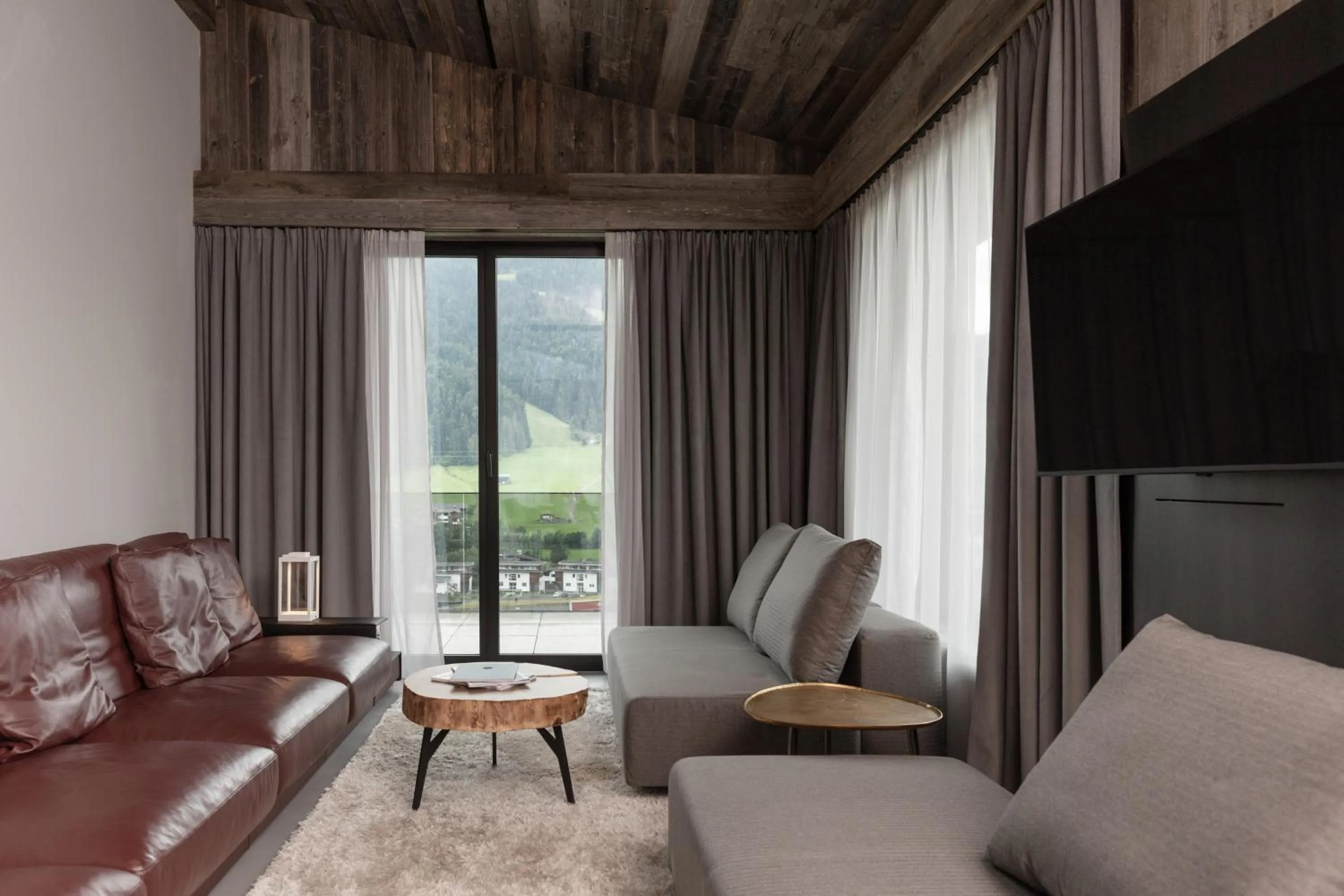 Living room in GOING TRIPLE A apartments WEST