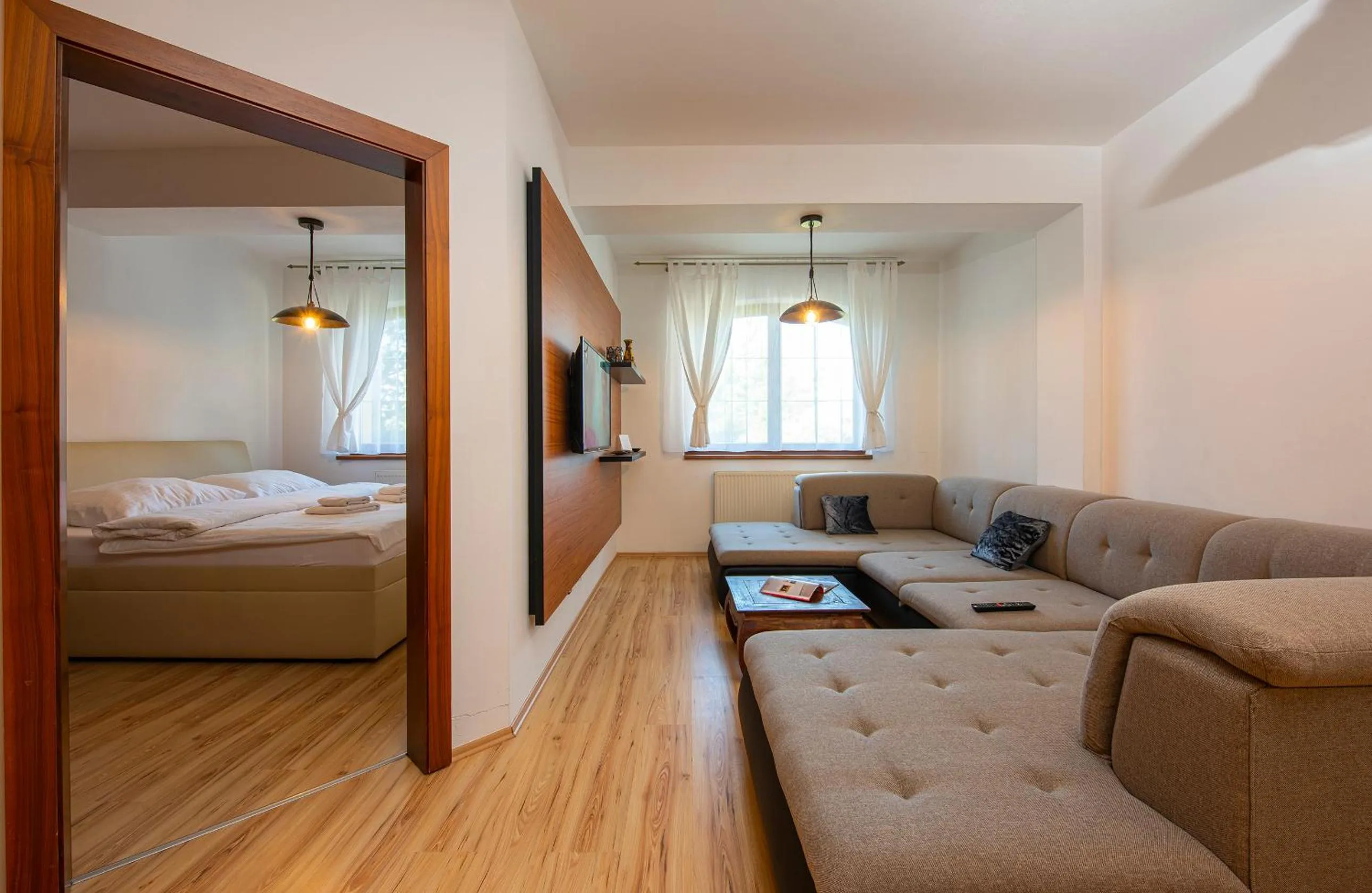 Living room, Bed in Apartmany Sileas