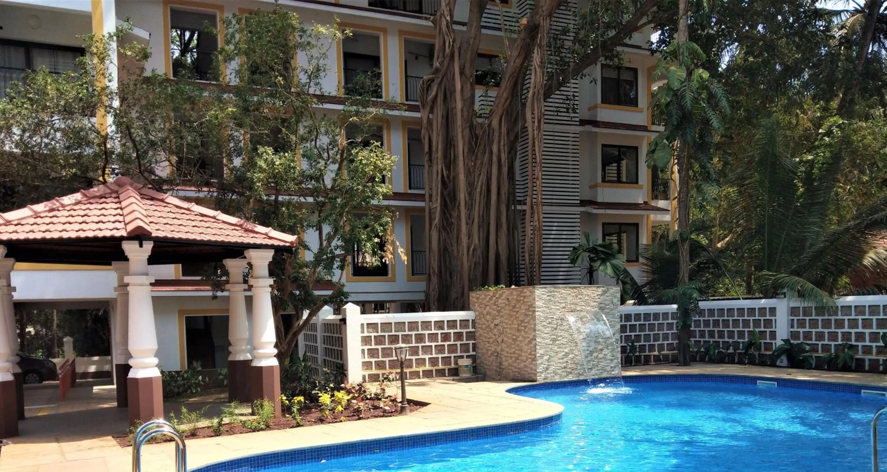 Swimming pool in Casa Legend Suites Candolim Goa