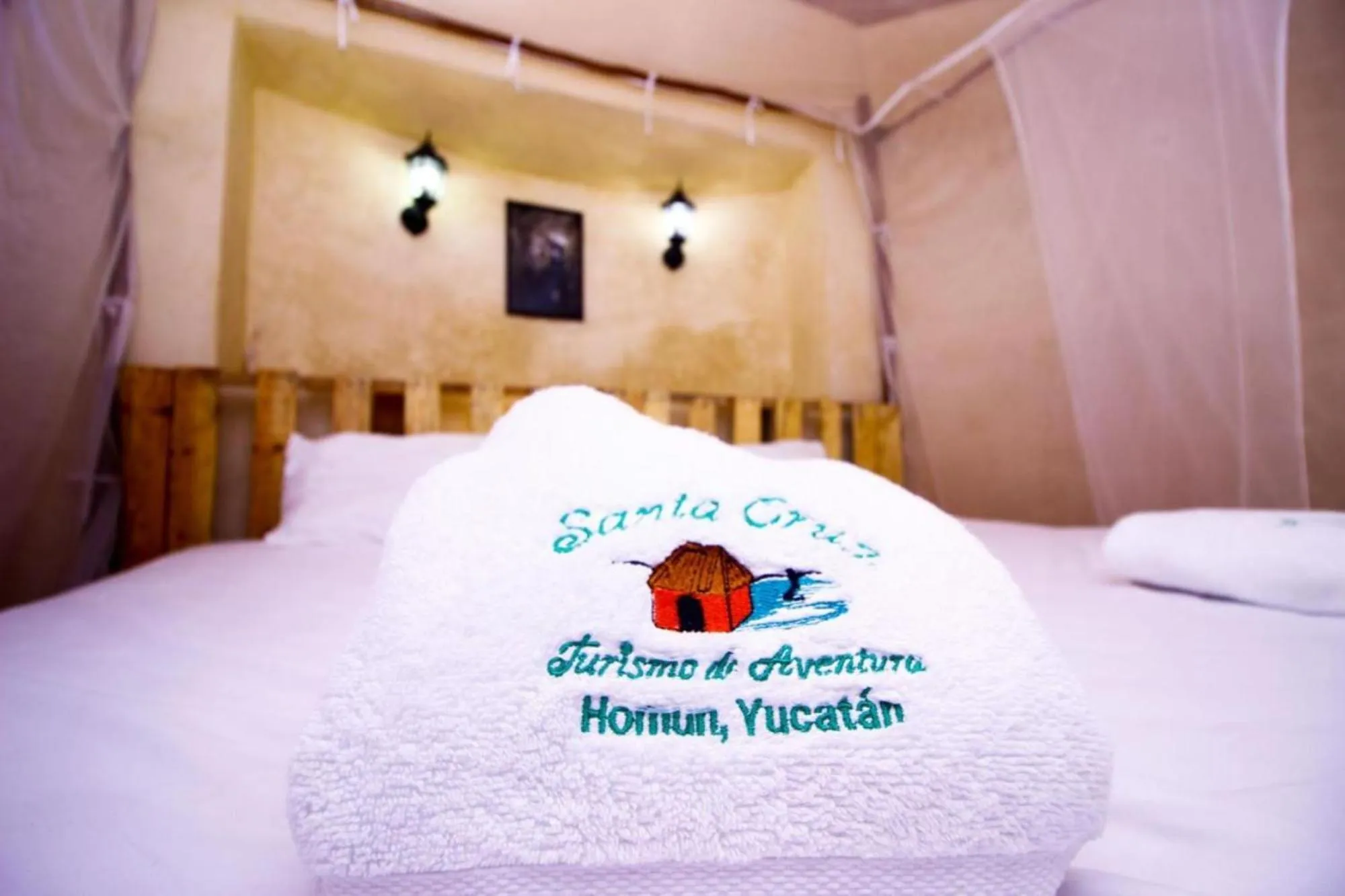 Bed in Cabañas Santa Cruz Homún