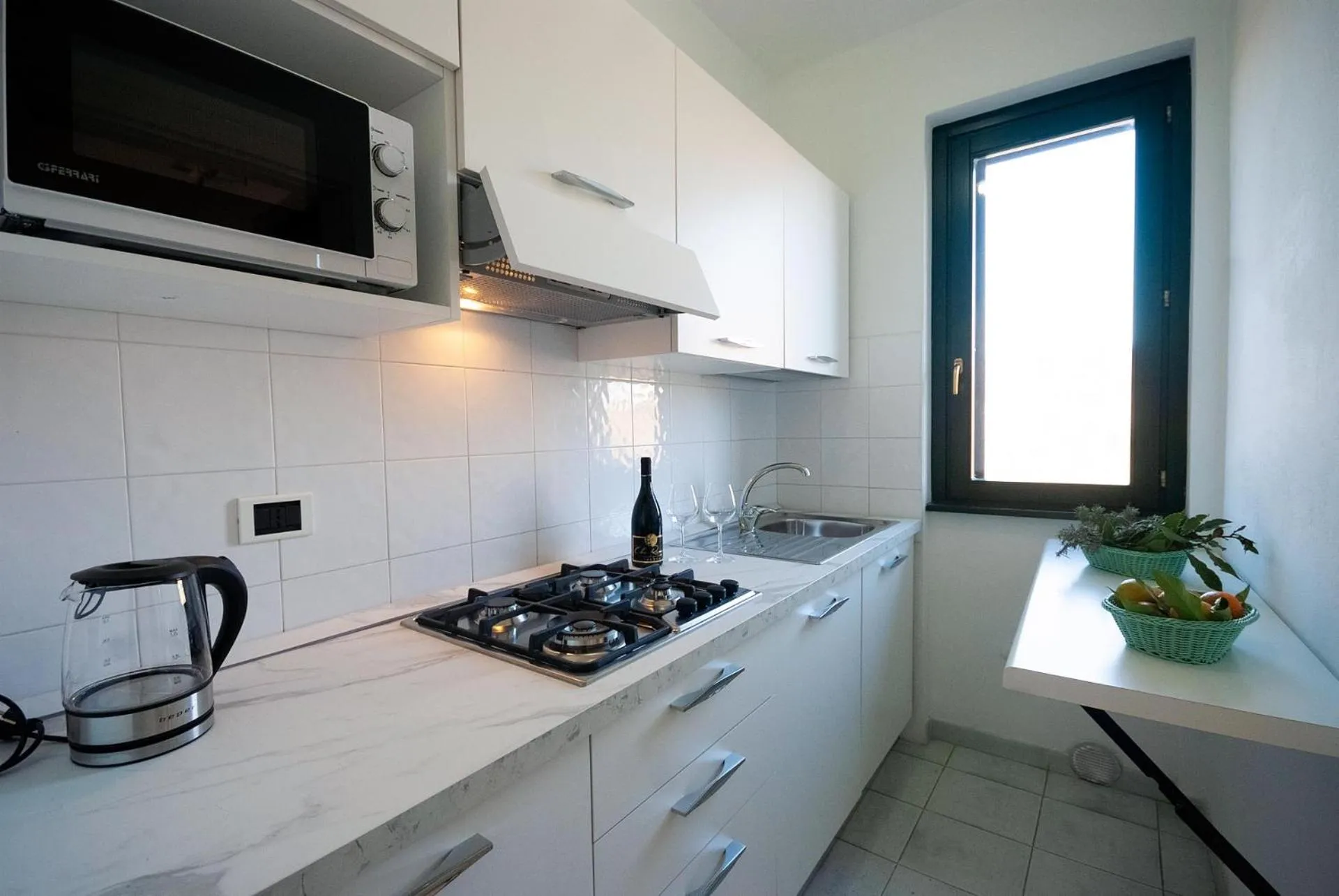 Kitchen or kitchenette in Hotel Residence Villa San Giovanni