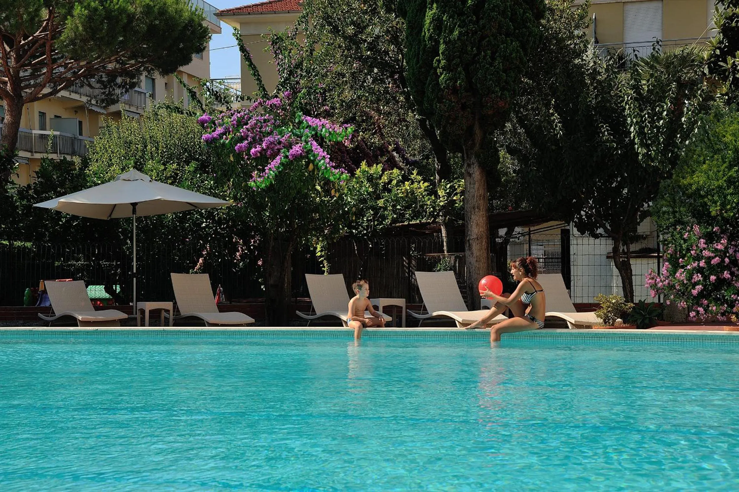 Swimming pool in Raffy Family & Bike Hotel