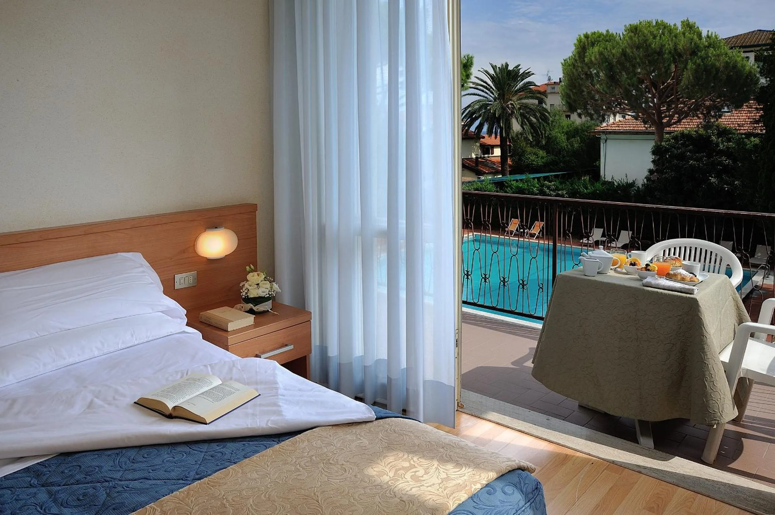 Balcony/Terrace, Bed in Raffy Family & Bike Hotel