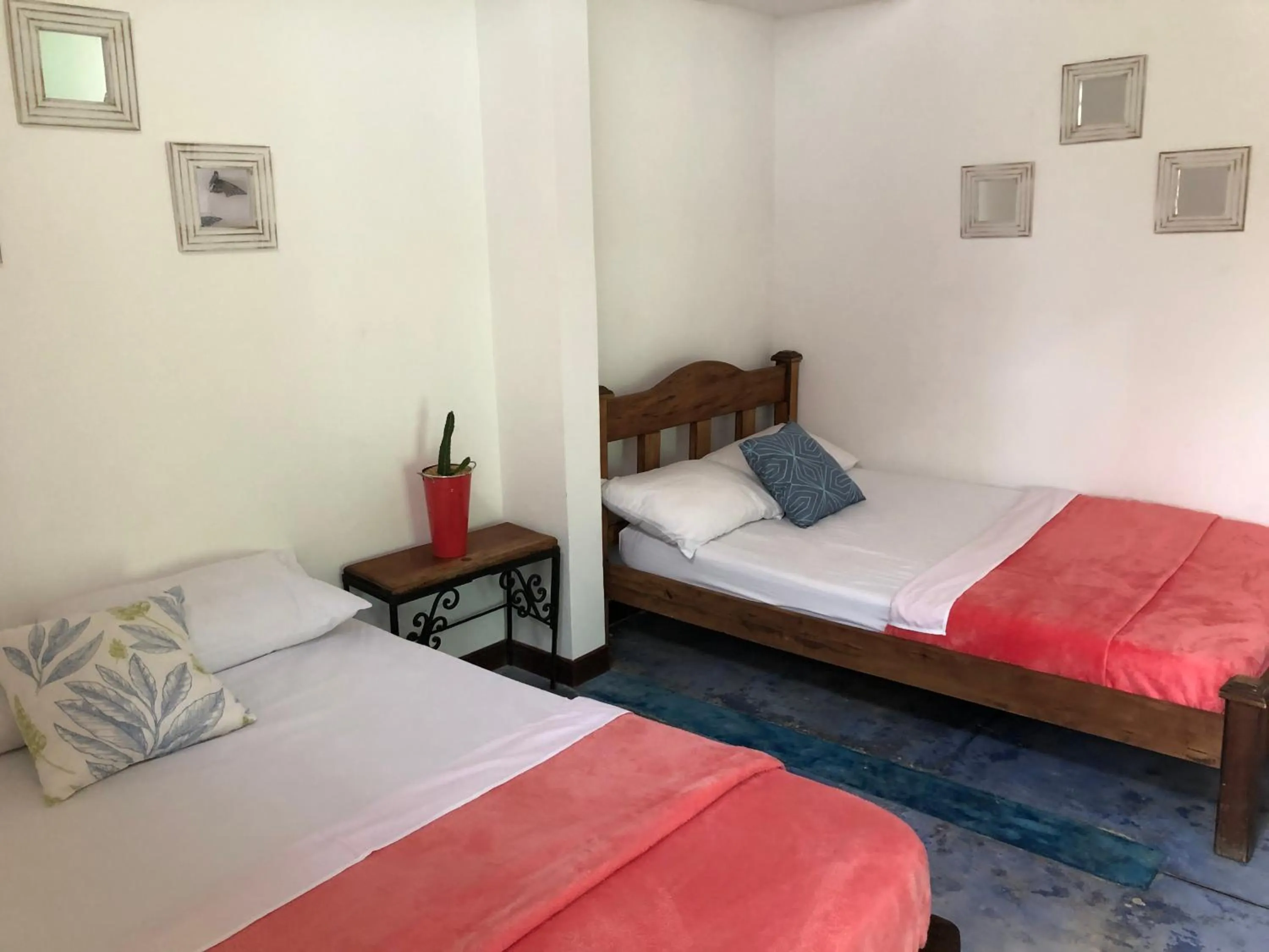 Bed in Finca Hotel Brasilia