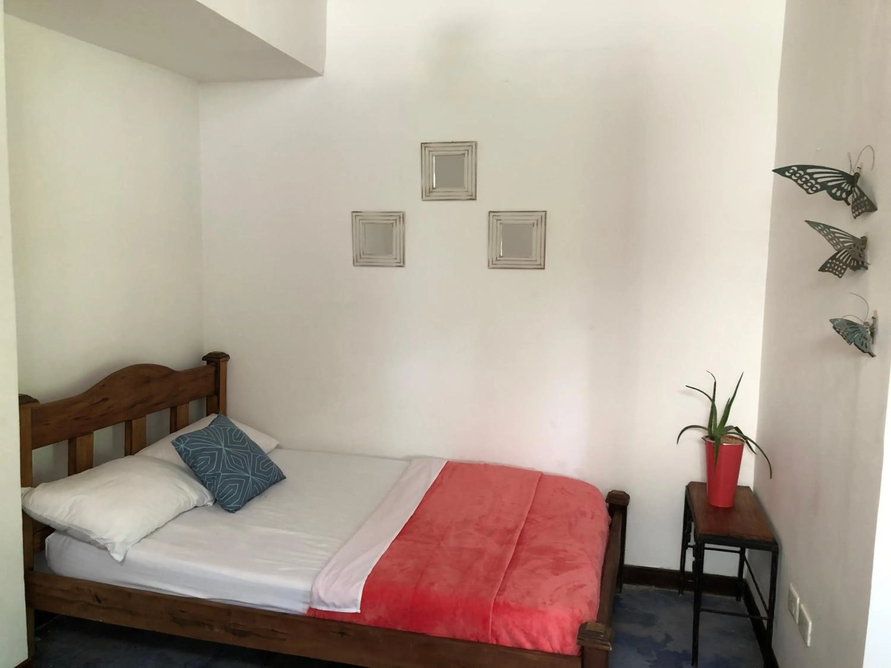 Bed in Finca Hotel Brasilia