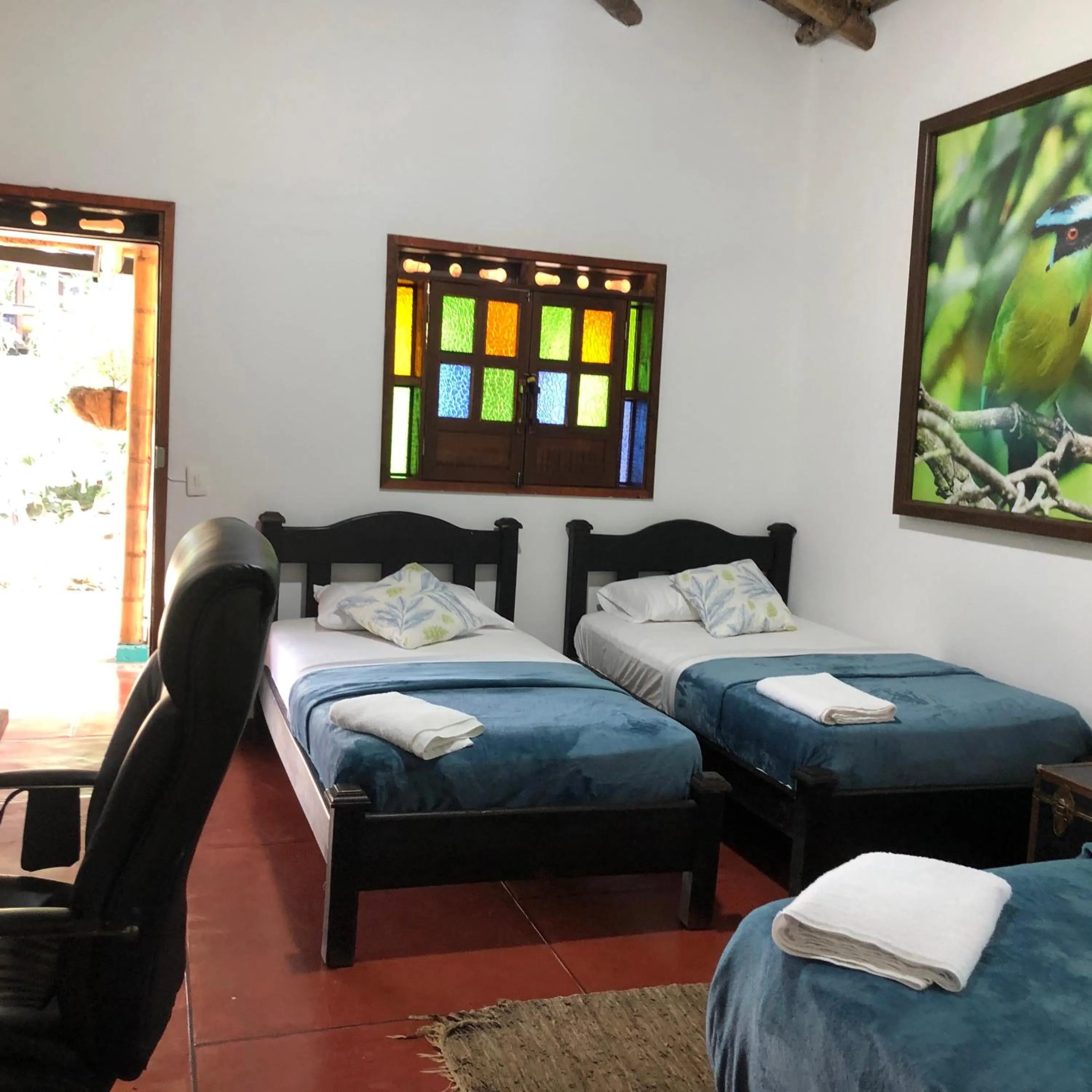 Bed in Finca Hotel Brasilia