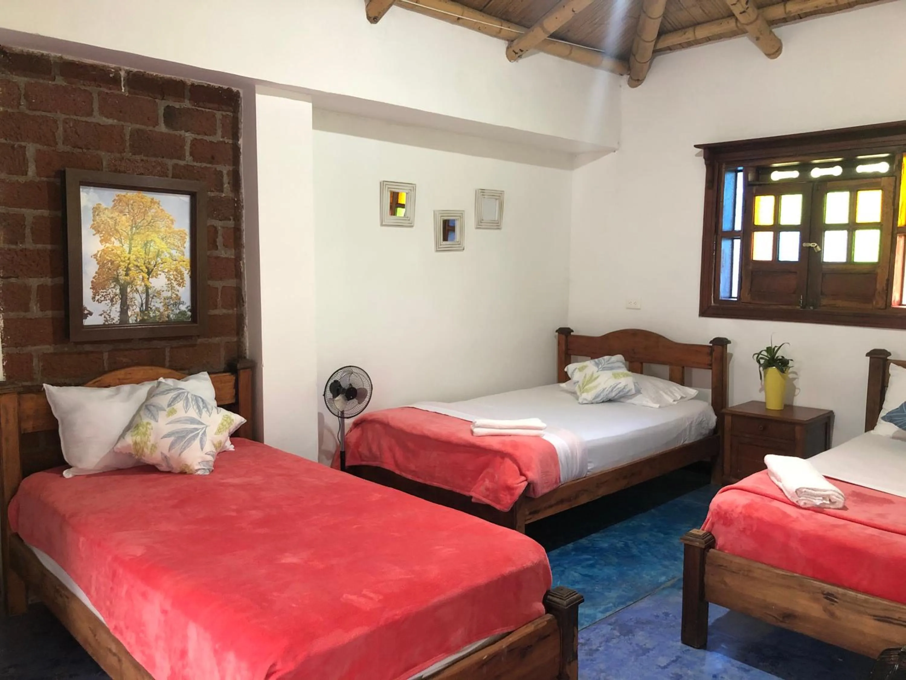 Bed in Finca Hotel Brasilia