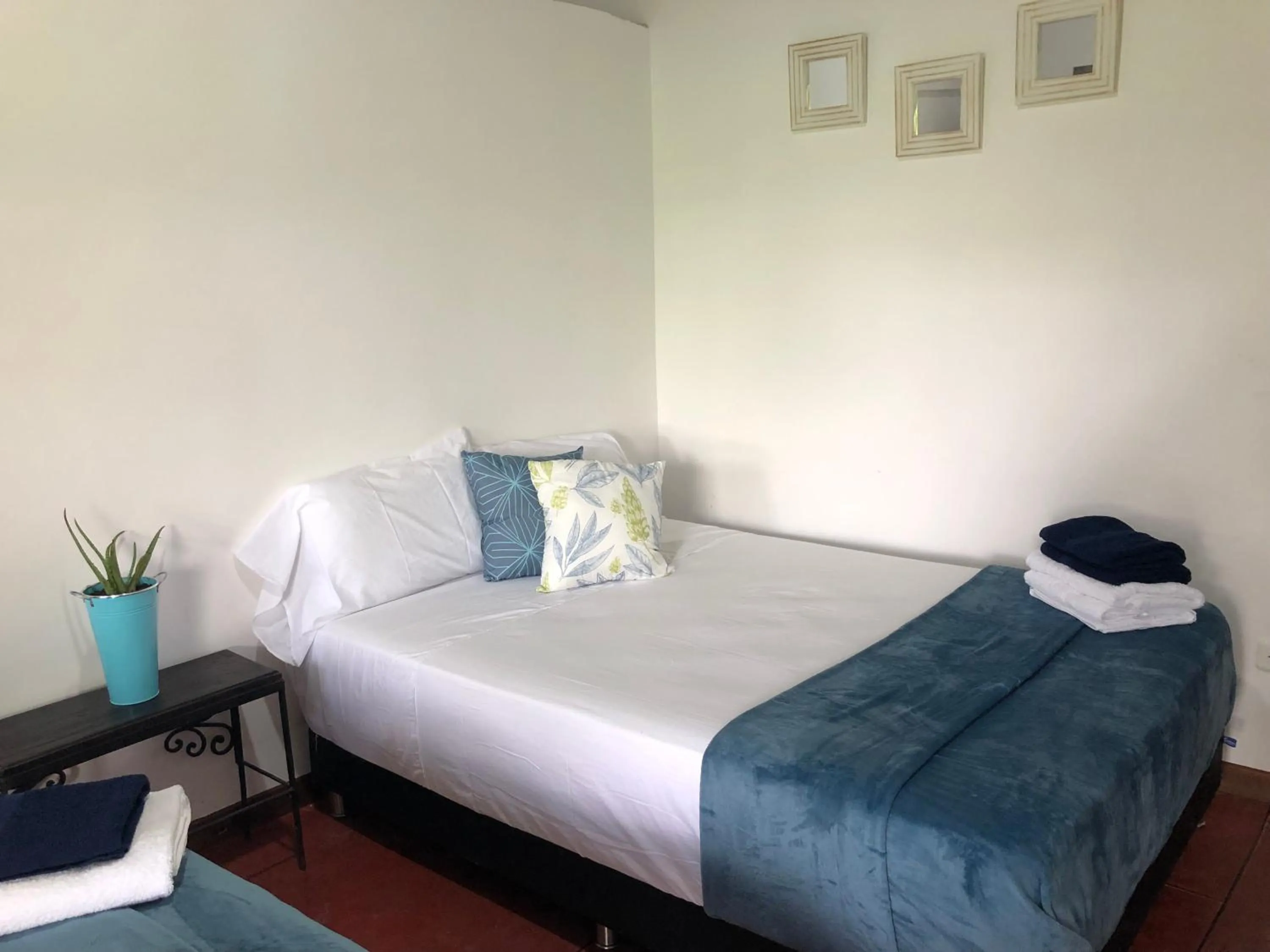 Bed in Finca Hotel Brasilia