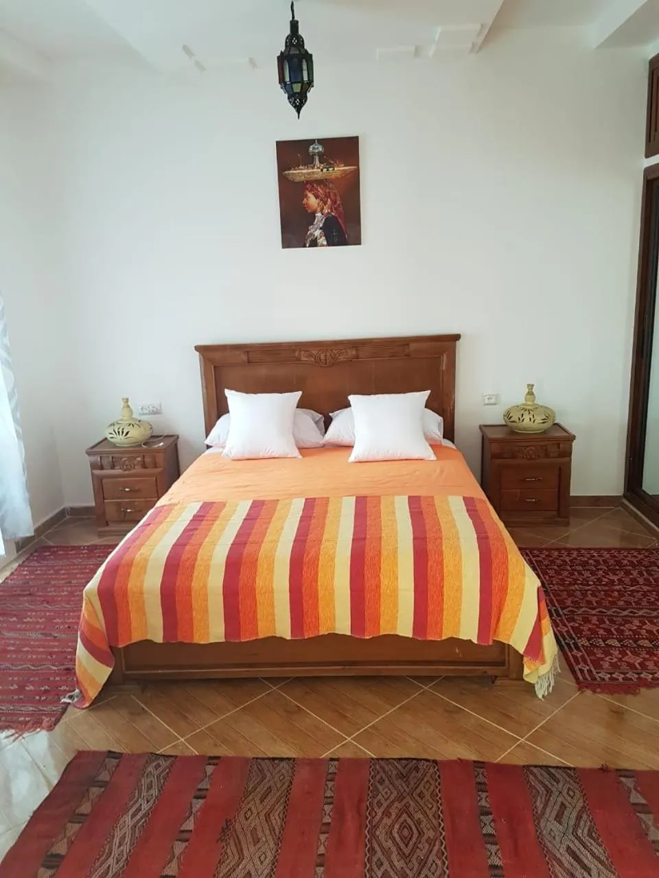 Bed in TANJITAN HOSPITALITE