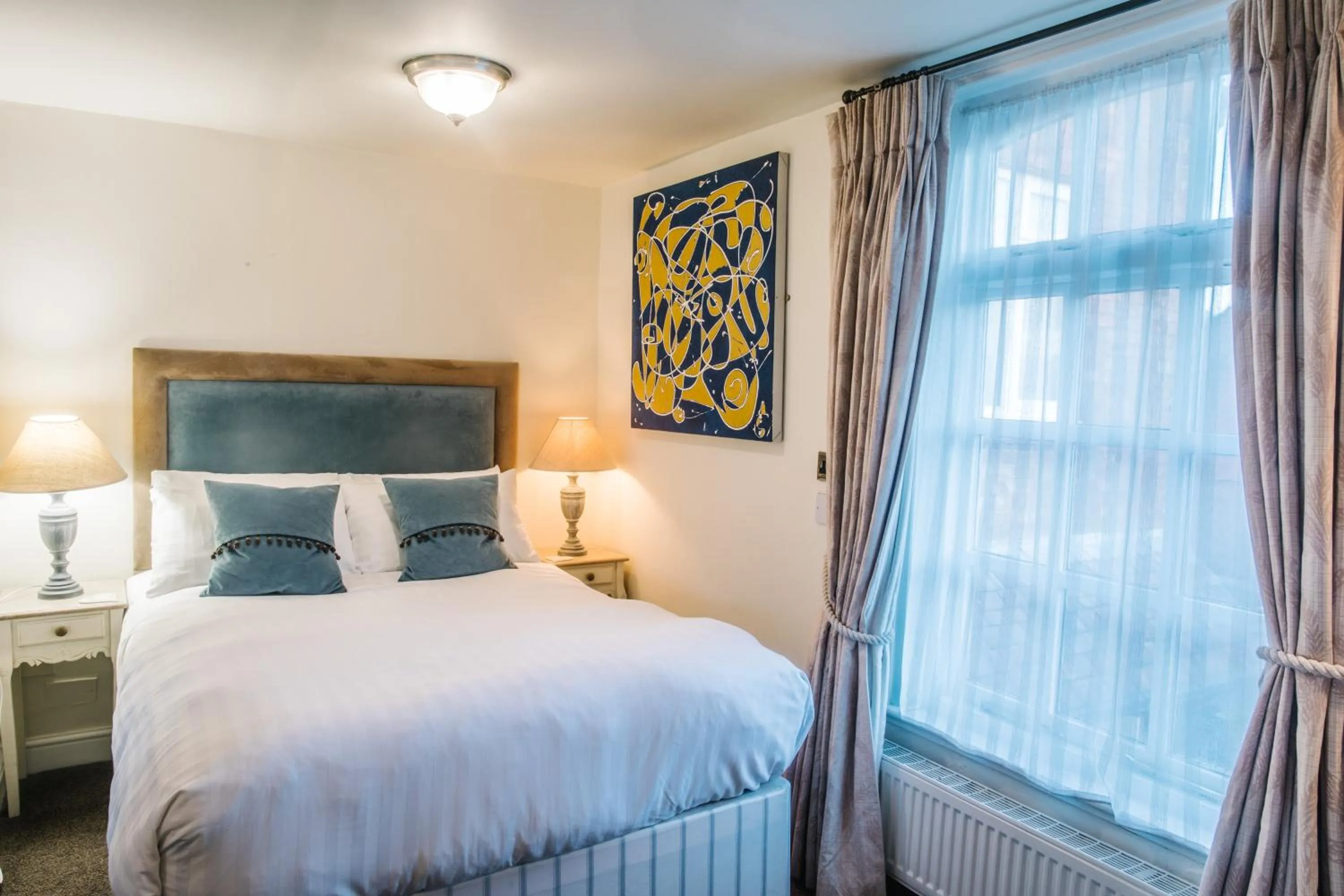 Bed in The Old Fourpenny Hotel