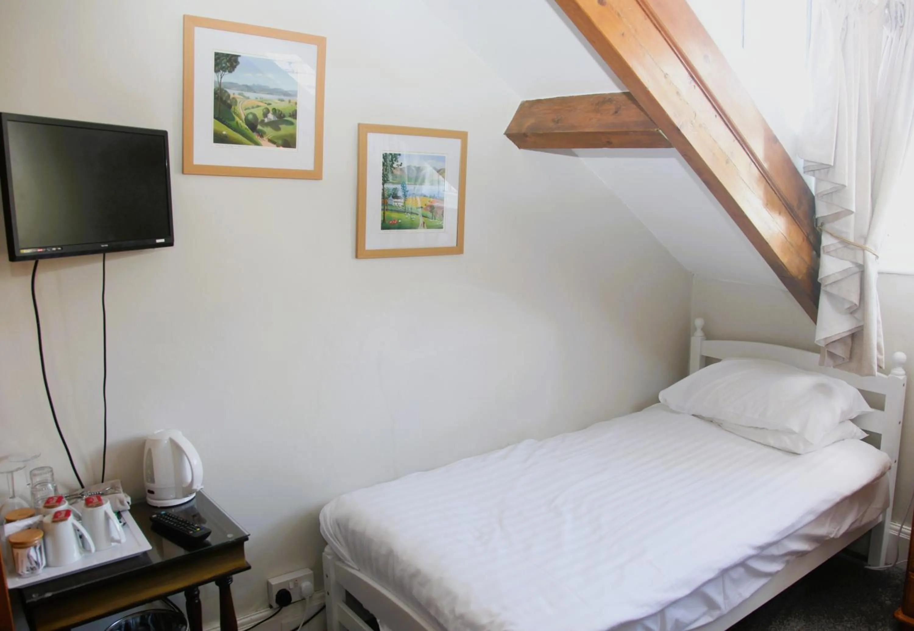 Bed in Kirkwood Guest House