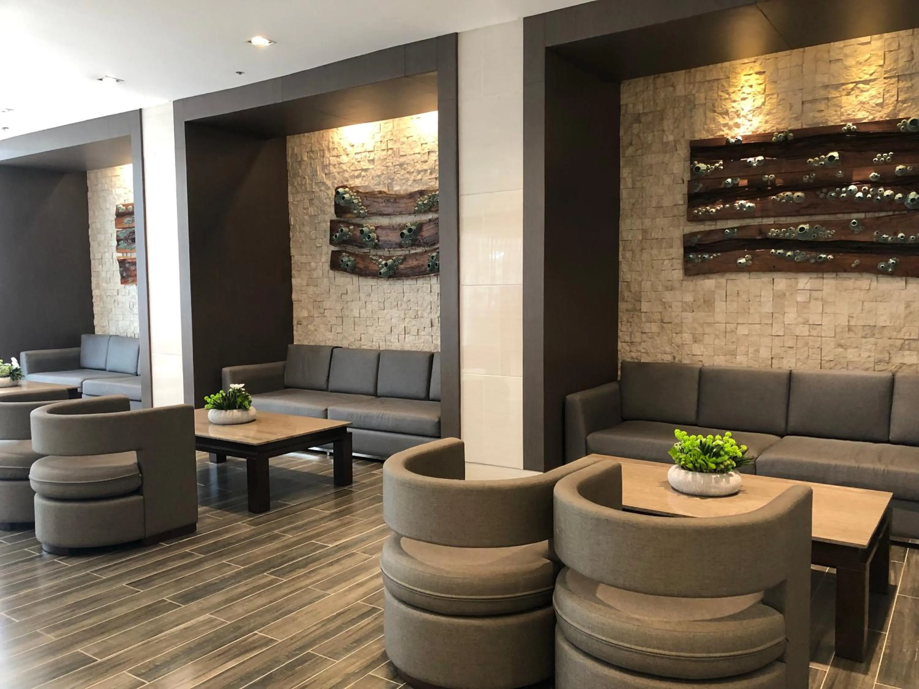 Lobby or reception in Shore Residences, Mall Of Asia Complex Stayction by PBYY