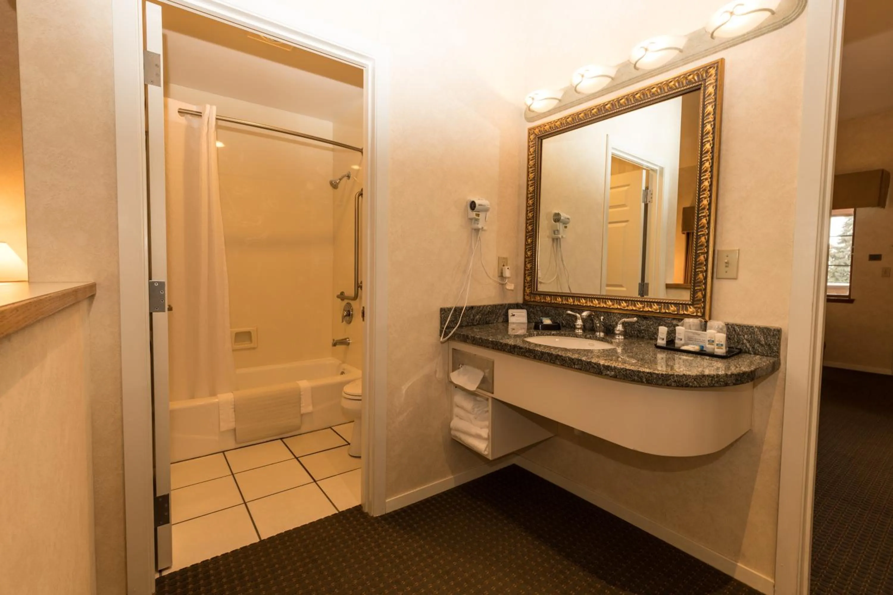 Shower in Lakeside Lodge and Suites