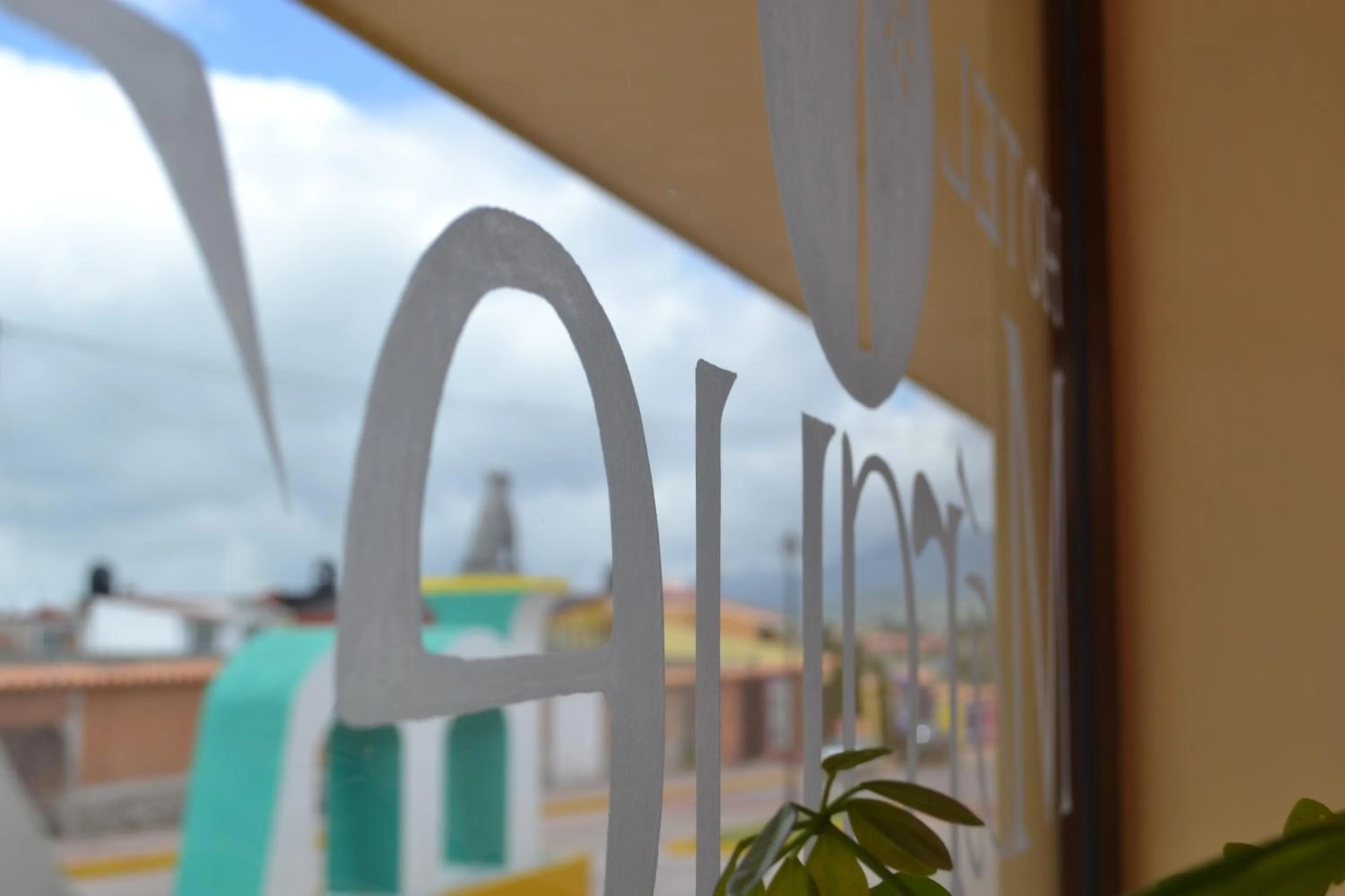 Property logo or sign in Hotel Márquez