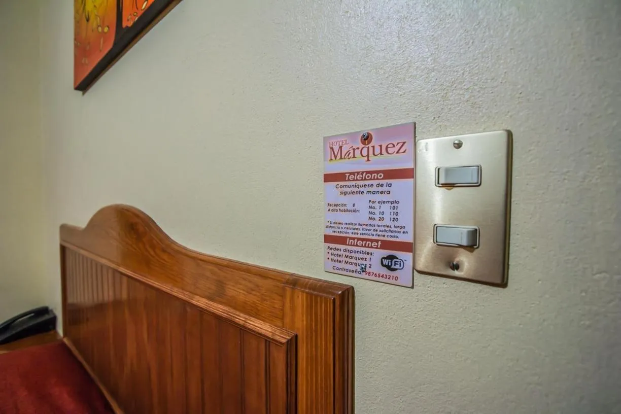 Property logo or sign in Hotel Márquez