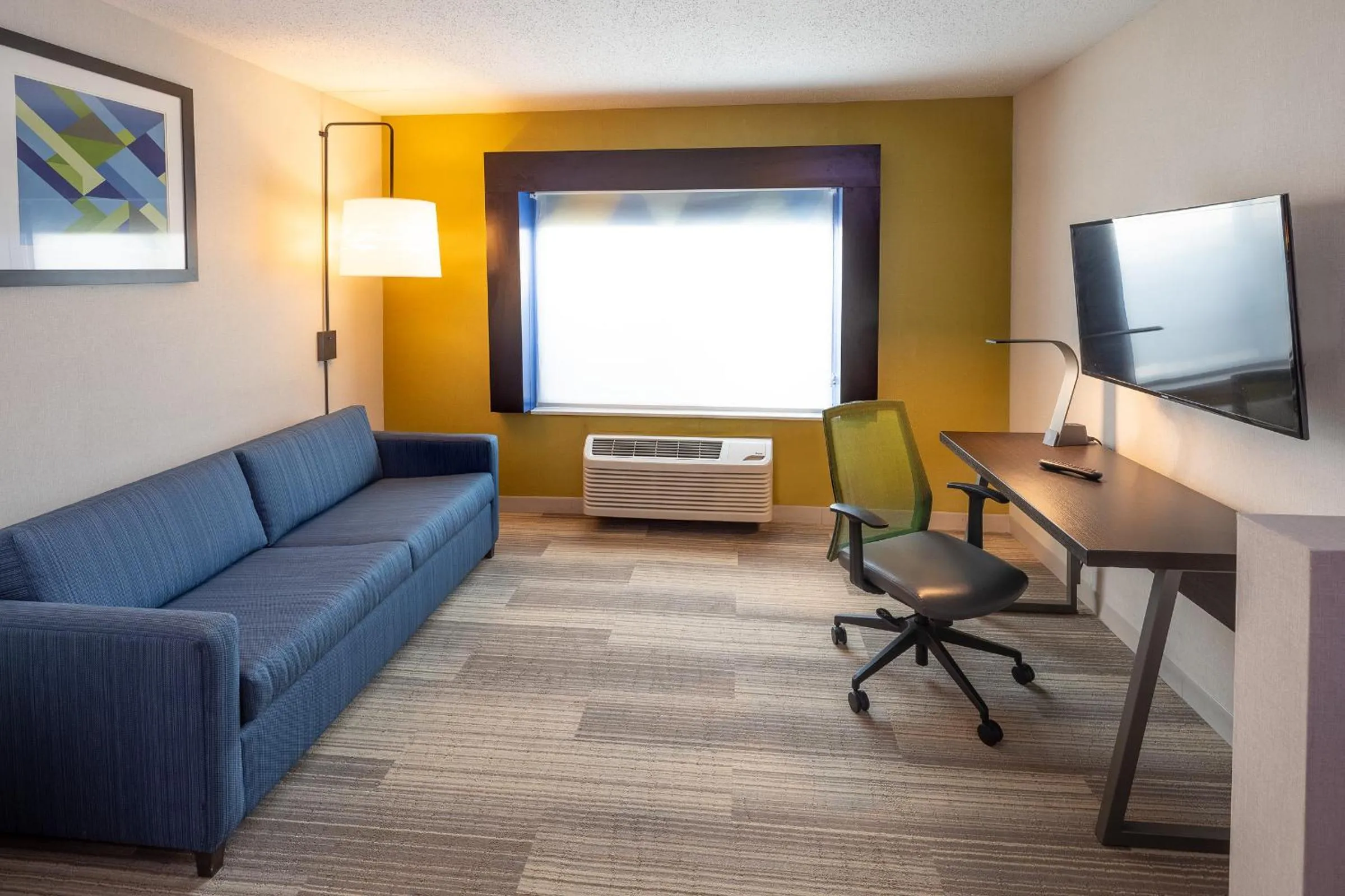 Living room in Holiday Inn Express & Suites Chicago West - St Charles by IHG