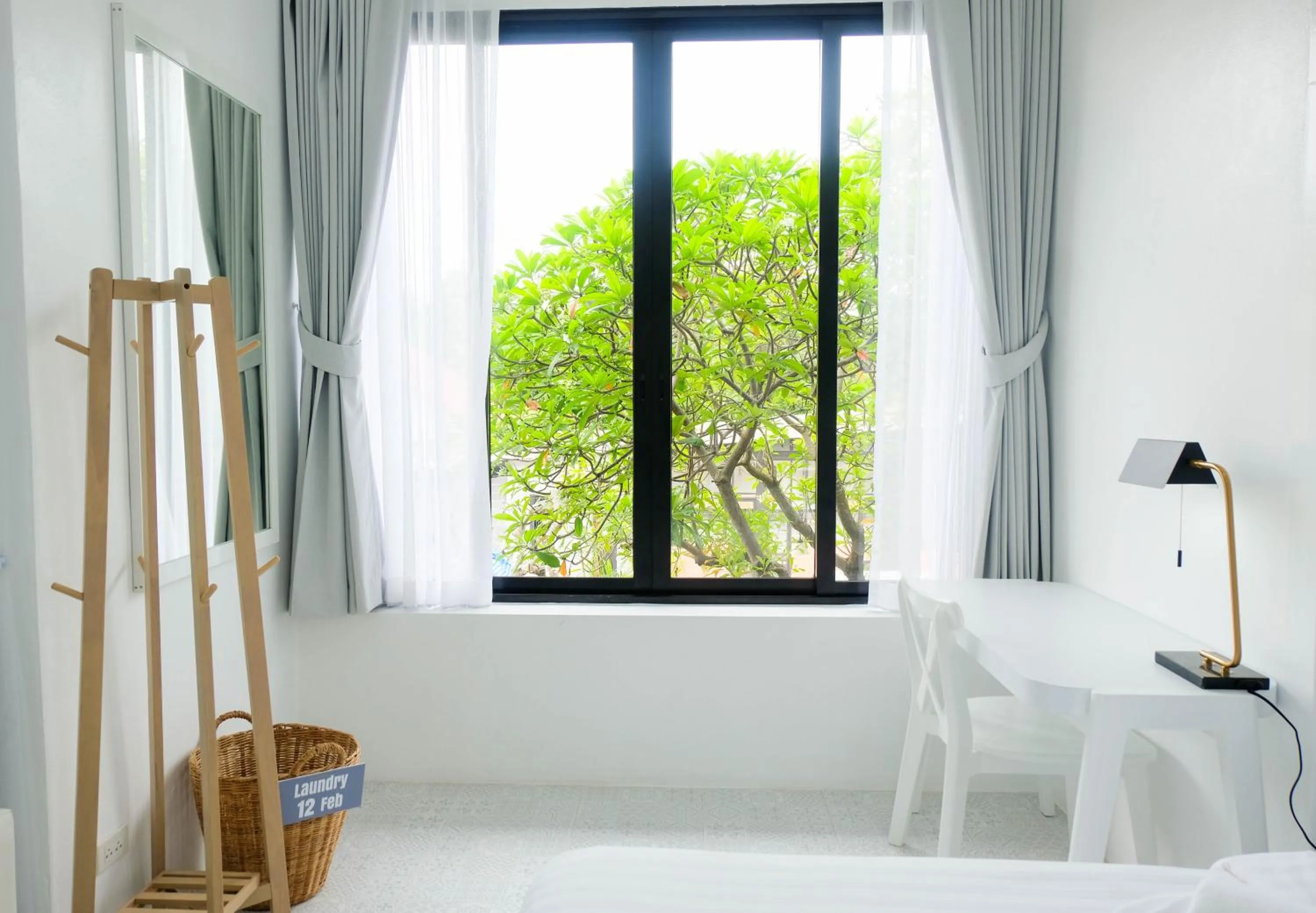 Seating area, Bed in Baan Poon Garden