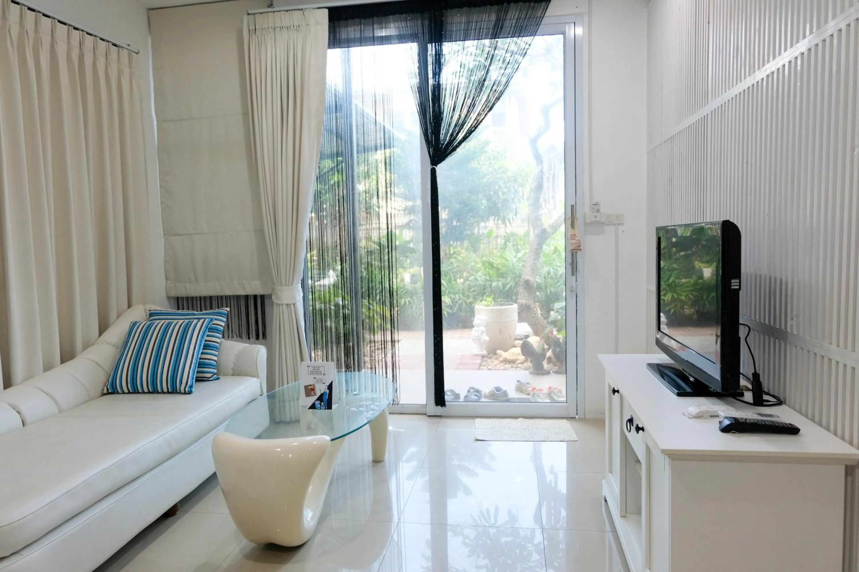 Seating area in Baan Poon Garden