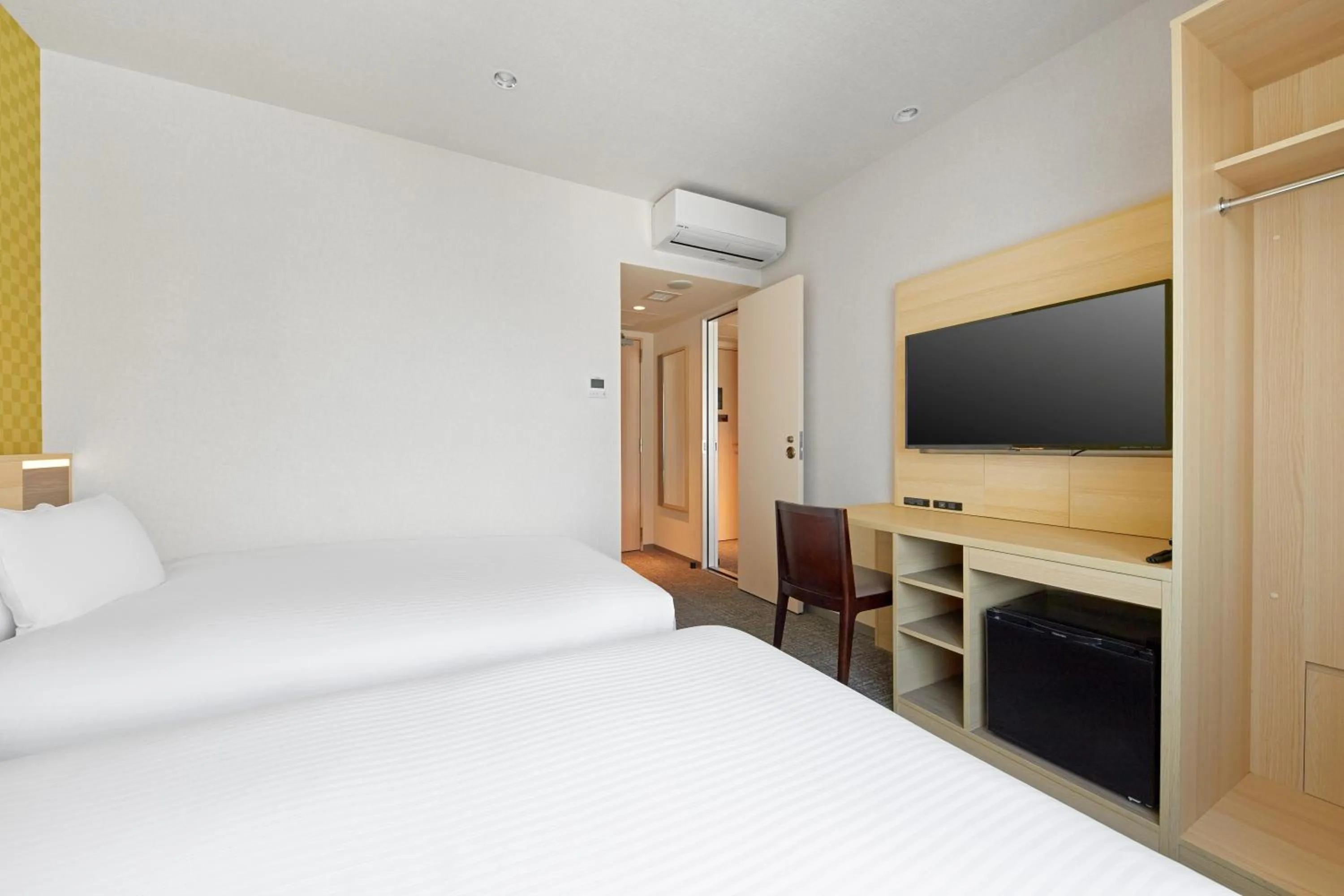 Bed in Sotetsu Fresa Inn Osaka Namba