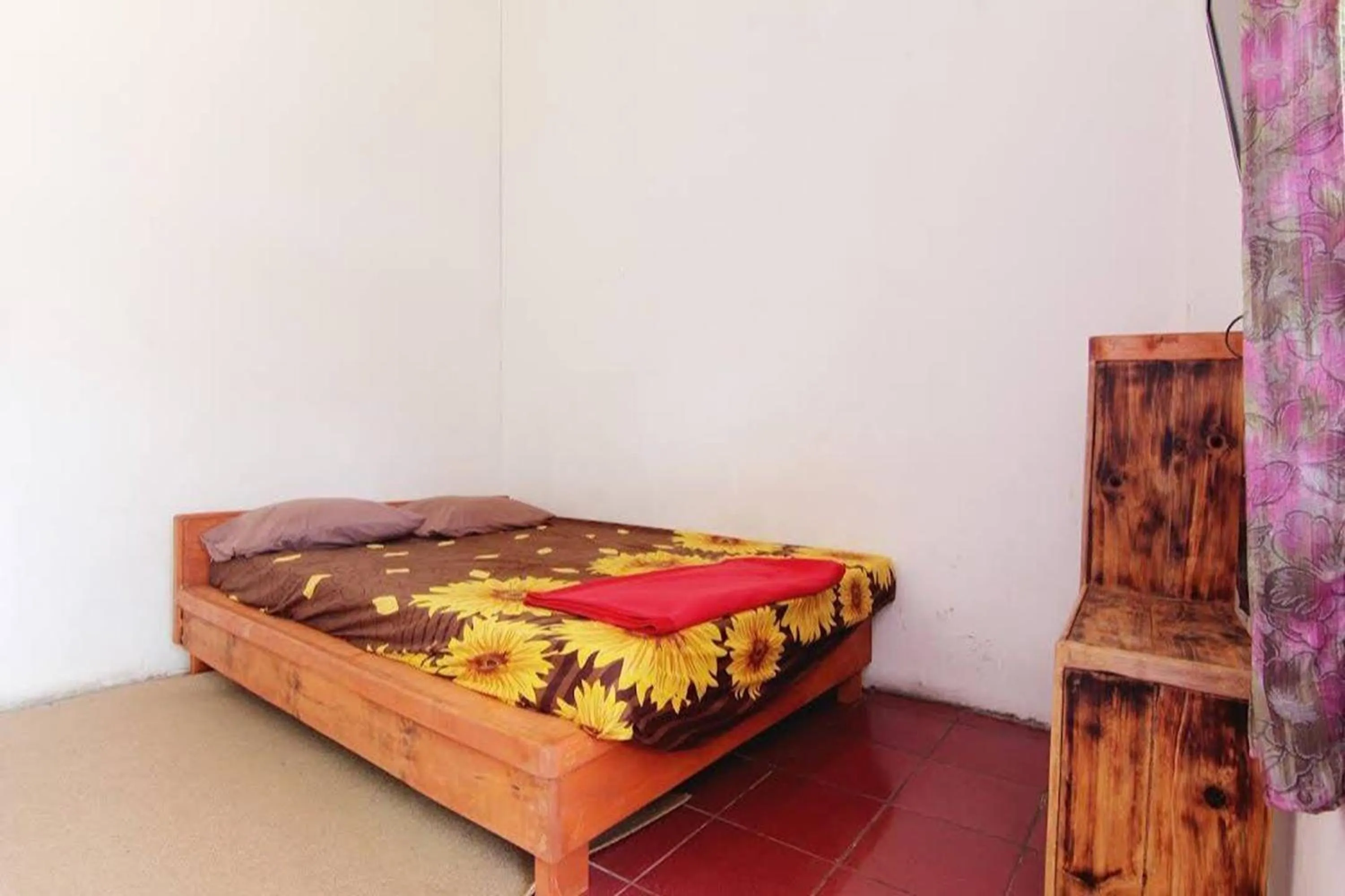 Bed in Villa Penginapan Purnama