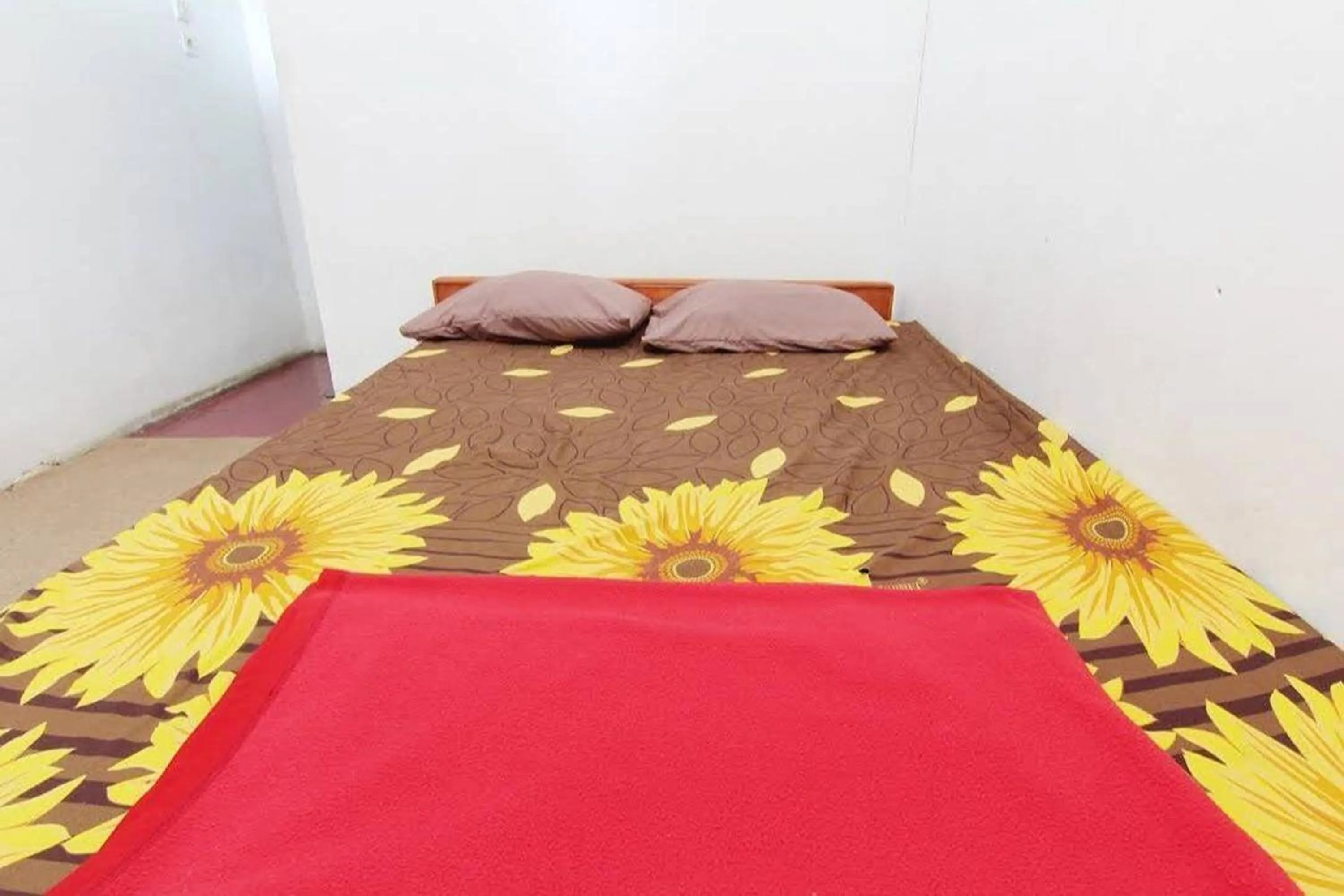 Bed in Villa Penginapan Purnama