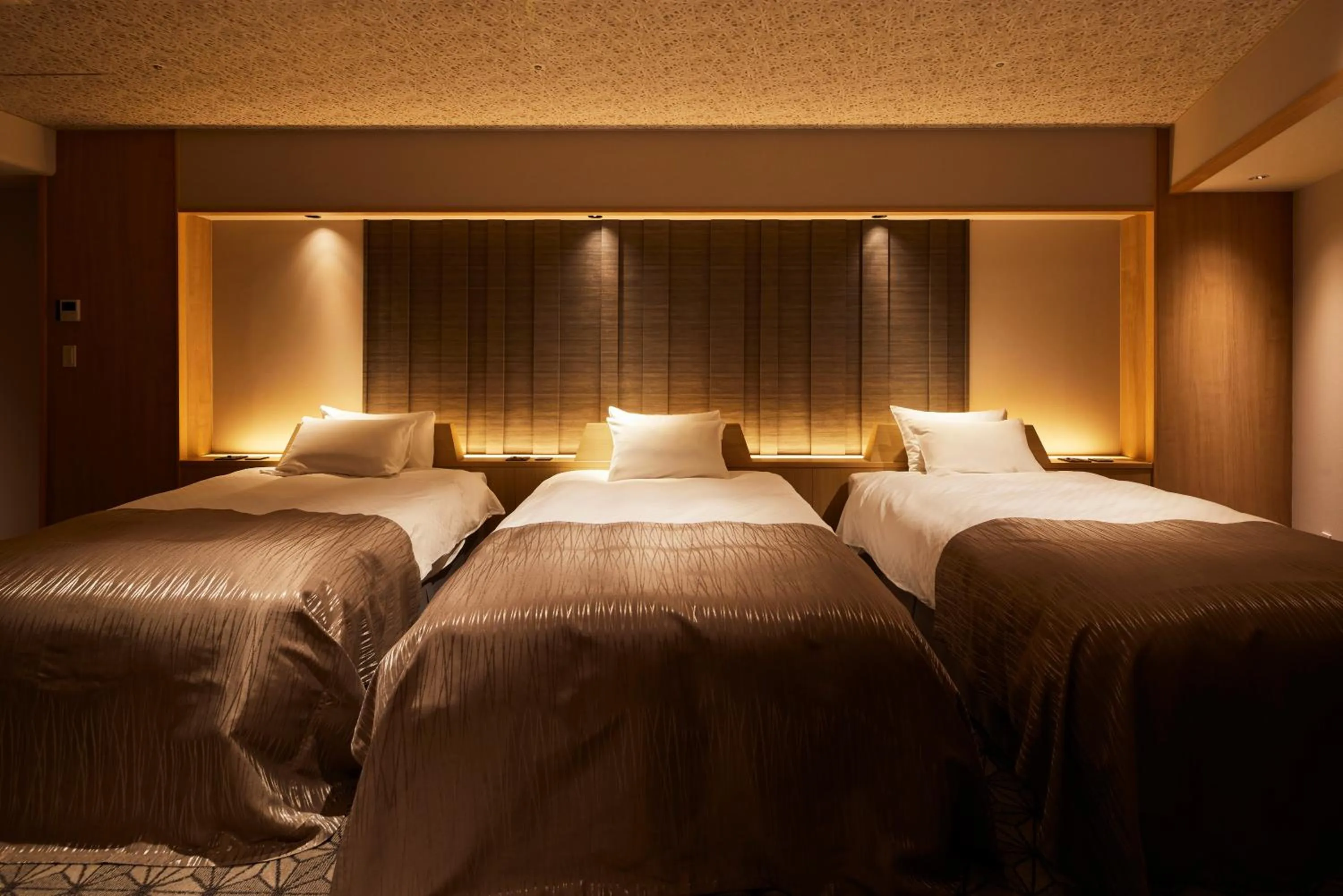 Bed in Yumoto Konpira Onsen Hananoyu Kobaitei