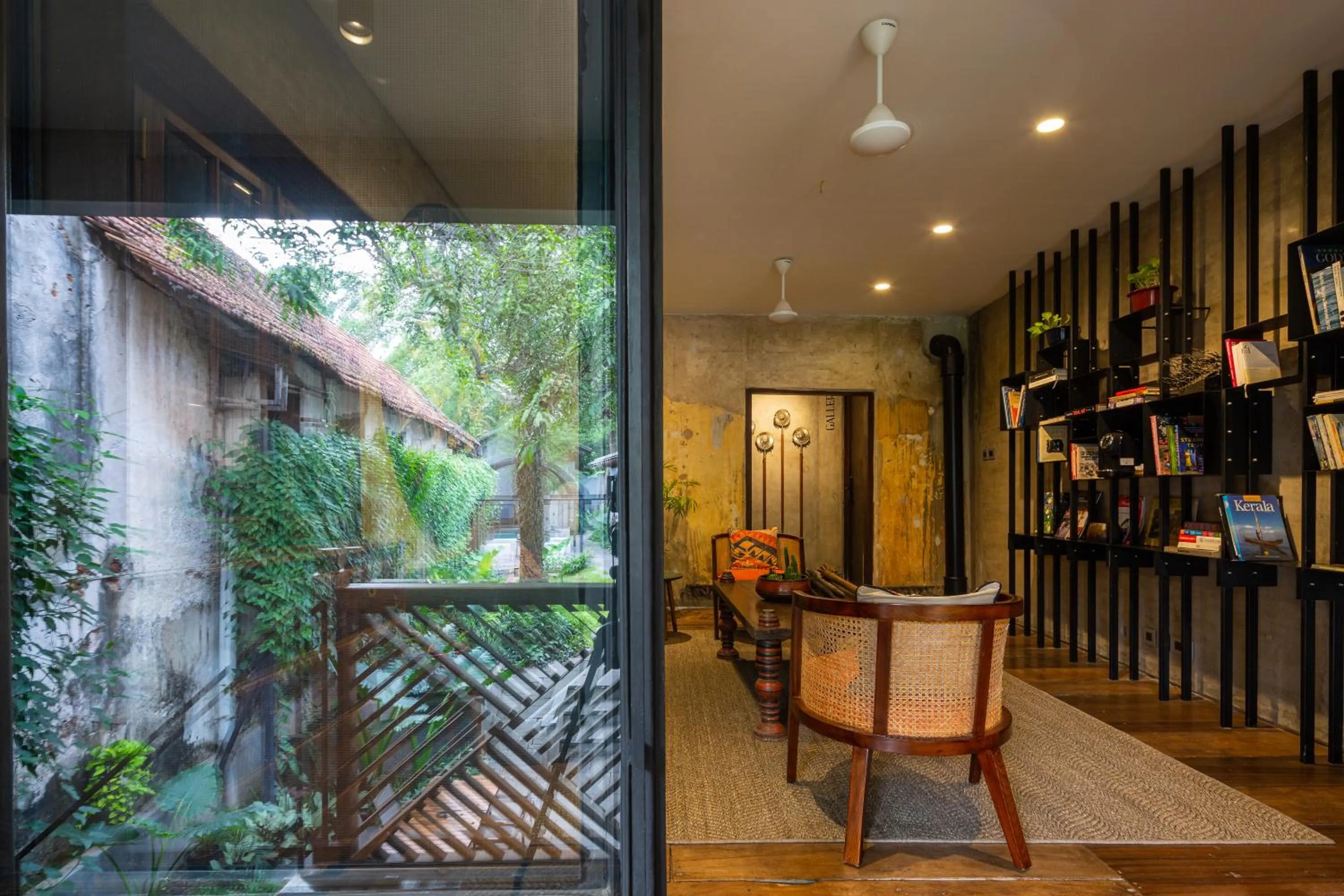 Seating area in The Postcard Mandalay Hall, Kochi