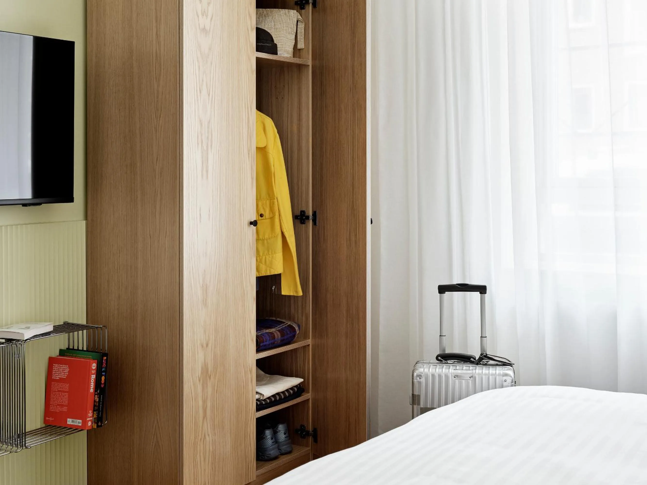 Bed in BRIK Apartment Hotel