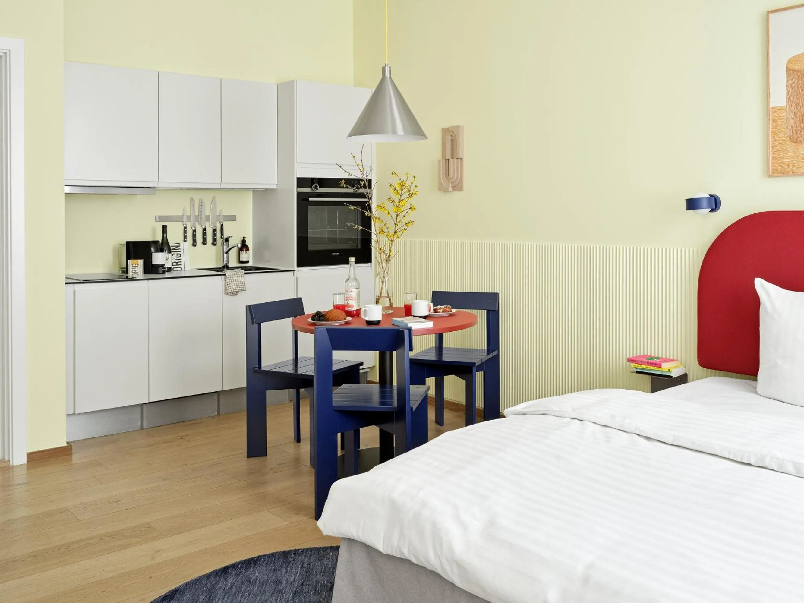 Kitchen or kitchenette, Bed in BRIK Apartment Hotel