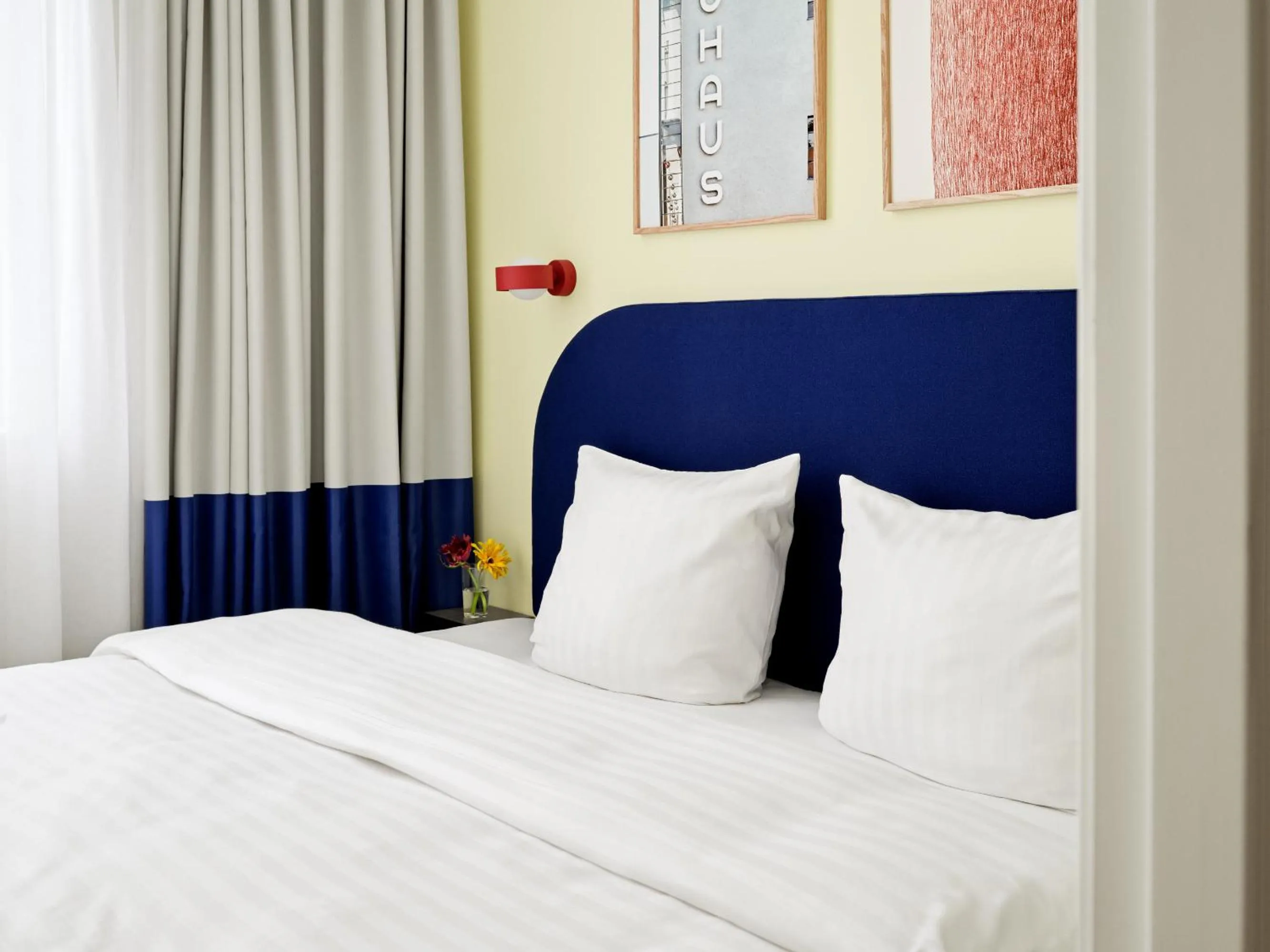 Bed in BRIK Apartment Hotel