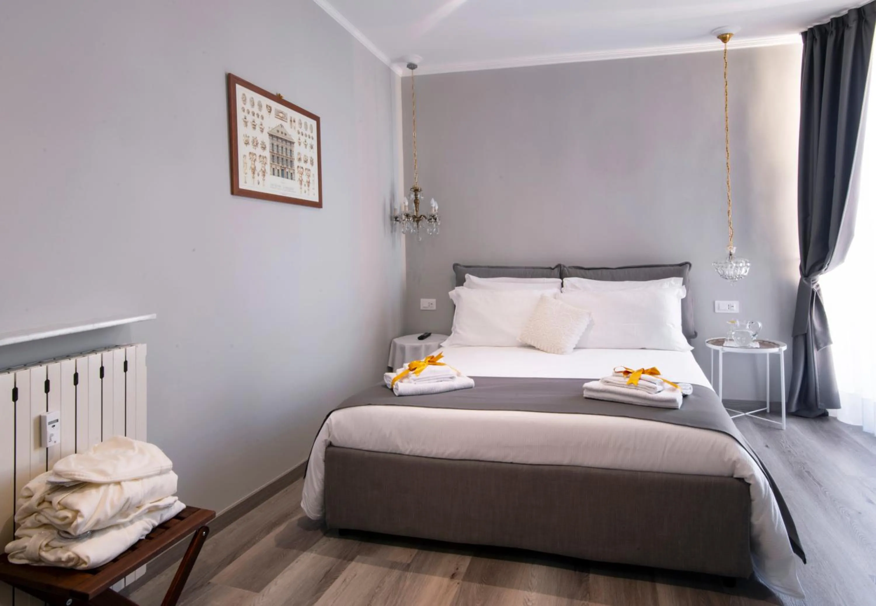 Photo of the whole room, Bed in Il Genovino