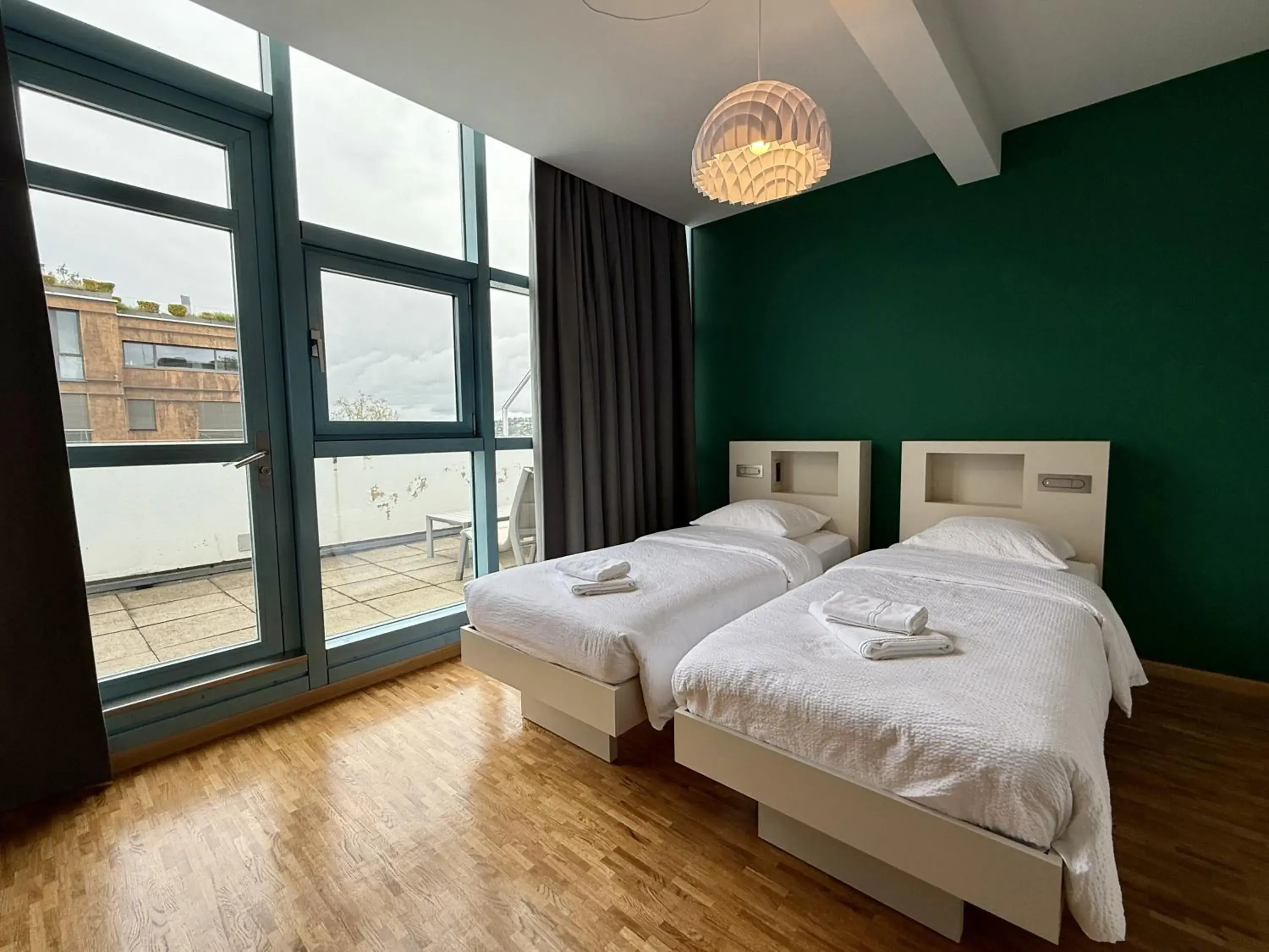 Twin Room with Private Bathroom in Geneva Hostel Twin Room with Private Bathroom in Geneva Hostel