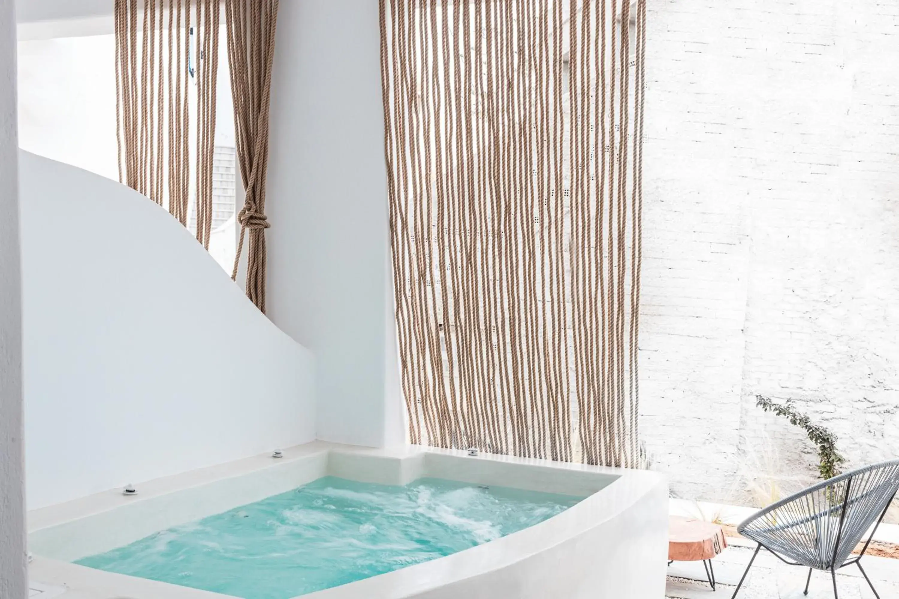 Honeymoon Suite Outdoor Jetted Tub - Street View in Bohemian Luxury Boutique Hotel, Adults Only Honeymoon Suite Outdoor Jetted Tub - Street View in Bohemian Luxury Boutique Hotel, Adults Only