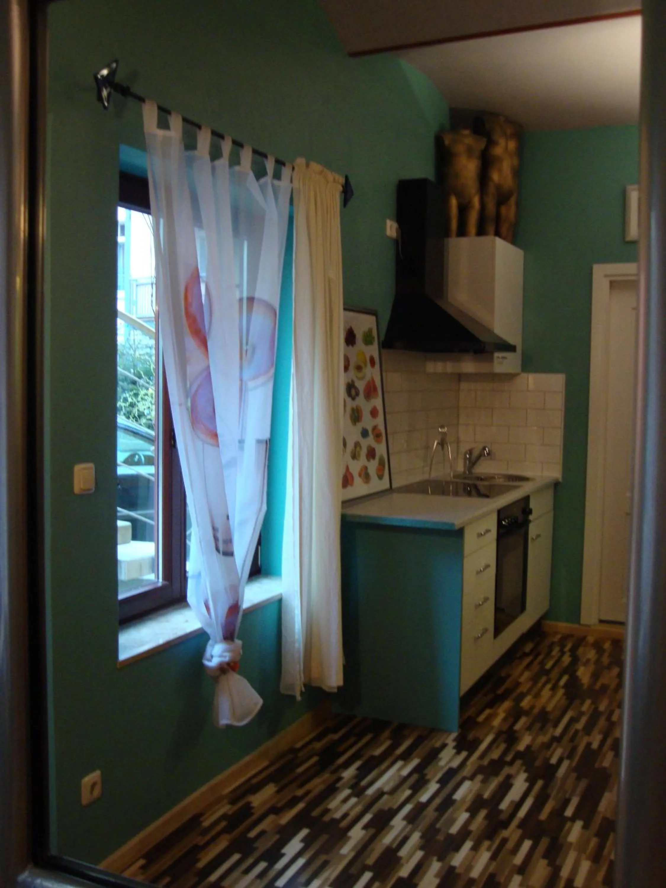 Kitchen or kitchenette in Art Apartments