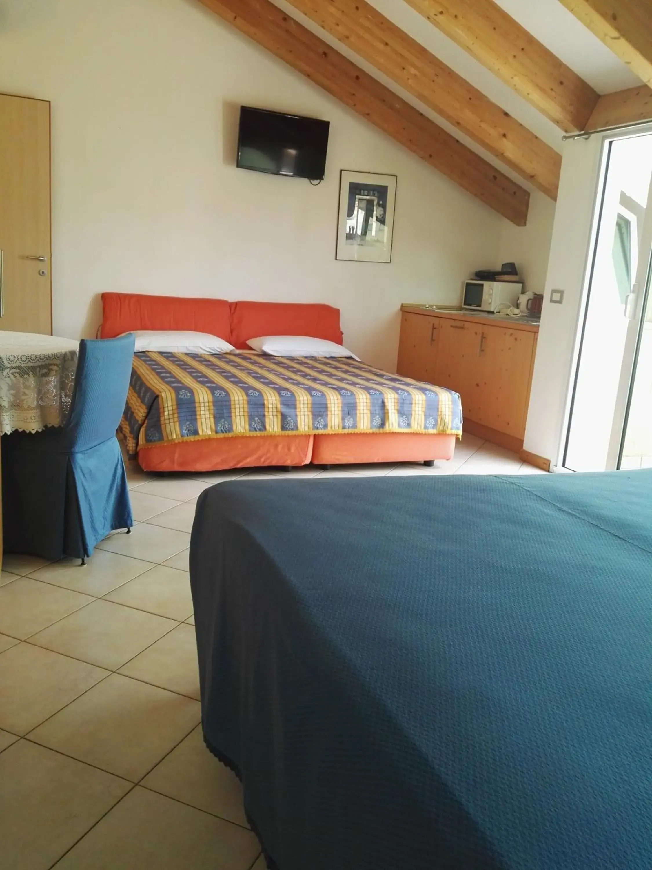 Deluxe Queen Room with Two Queen Beds in Hotel Venezia e la Villetta Deluxe Queen Room with Two Queen Beds in Hotel Venezia e la Villetta