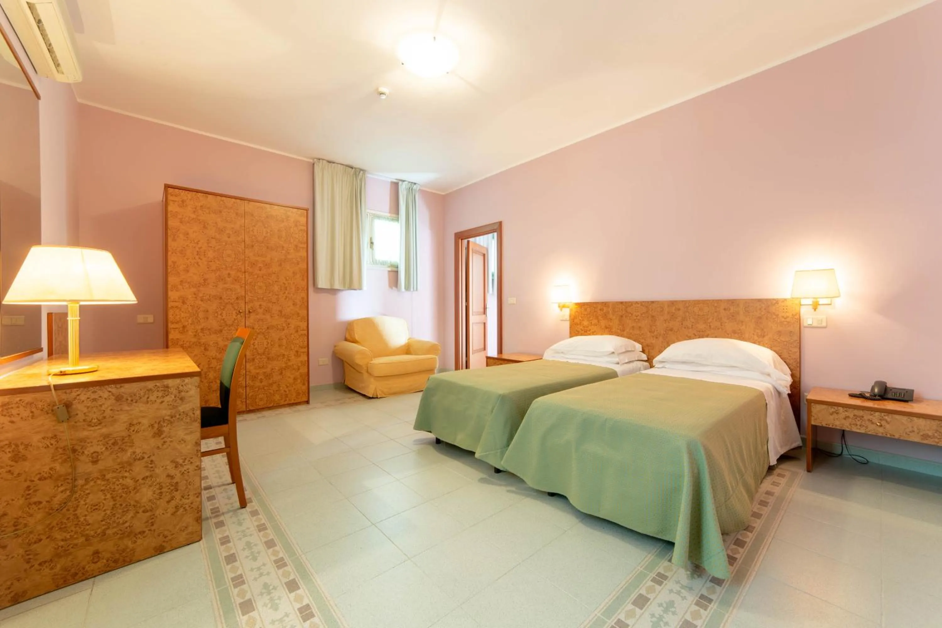 Bed in Antica Masseria Li Sauli