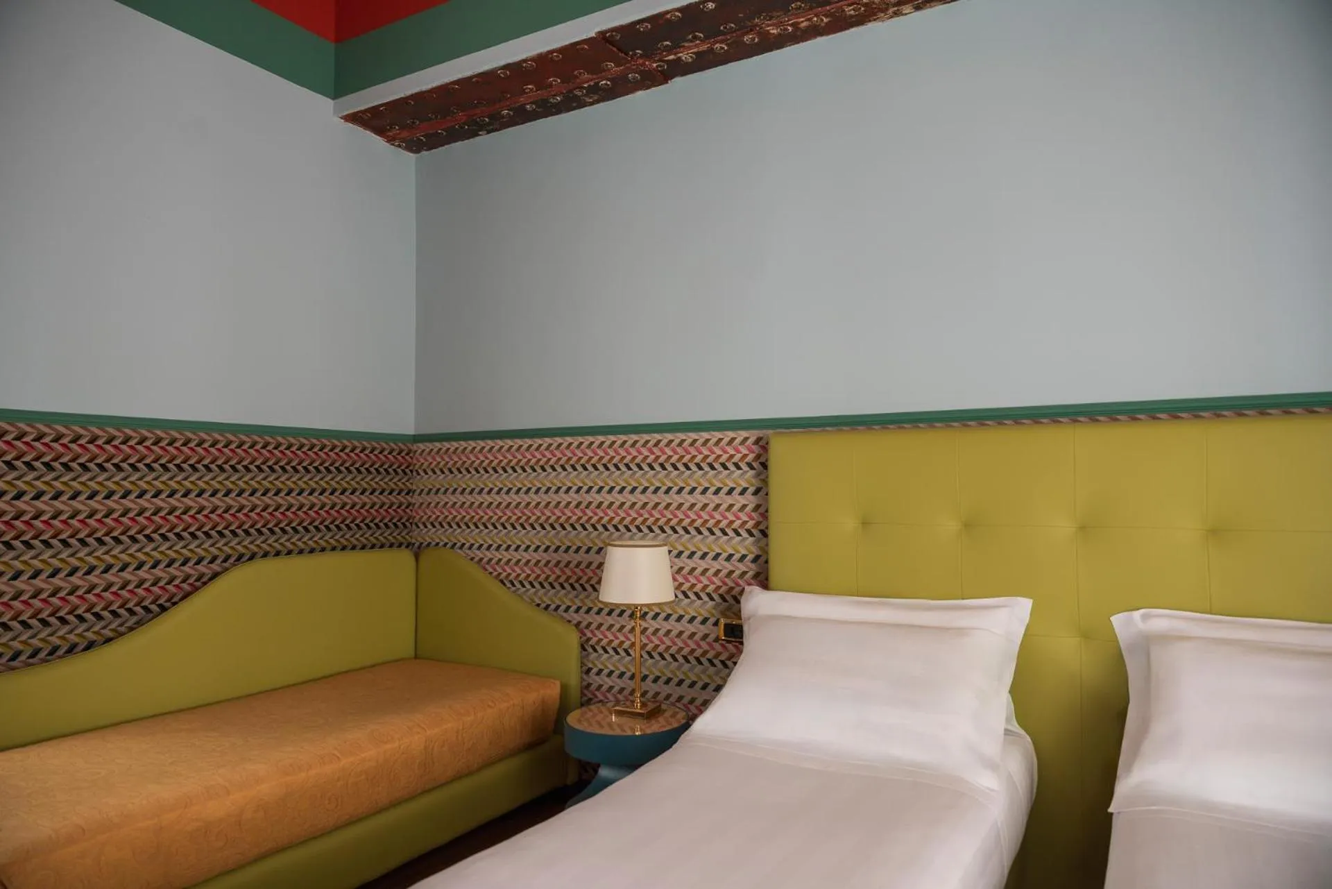 Bed in Hotel Oceania