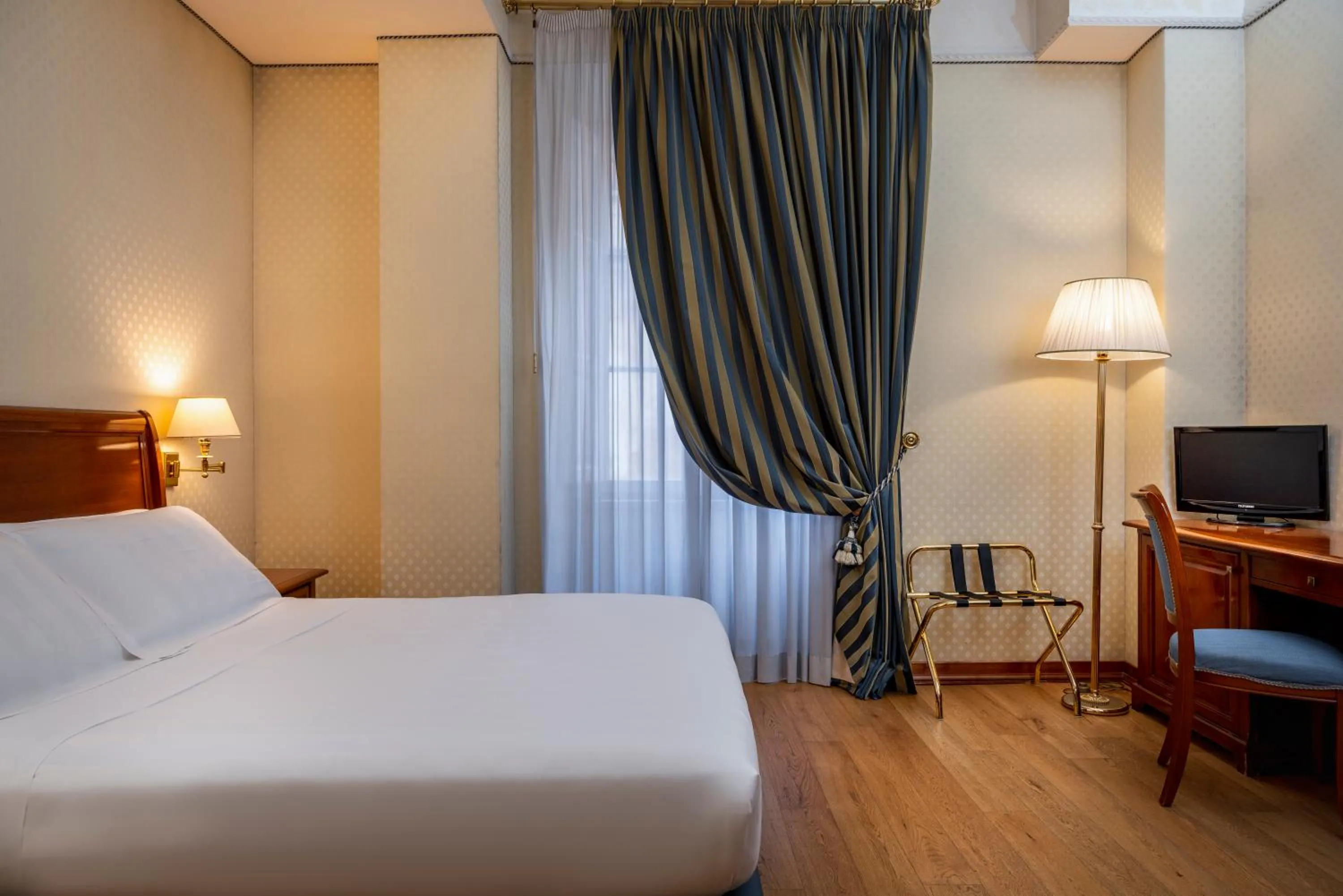 Bed in Hotel Oceania