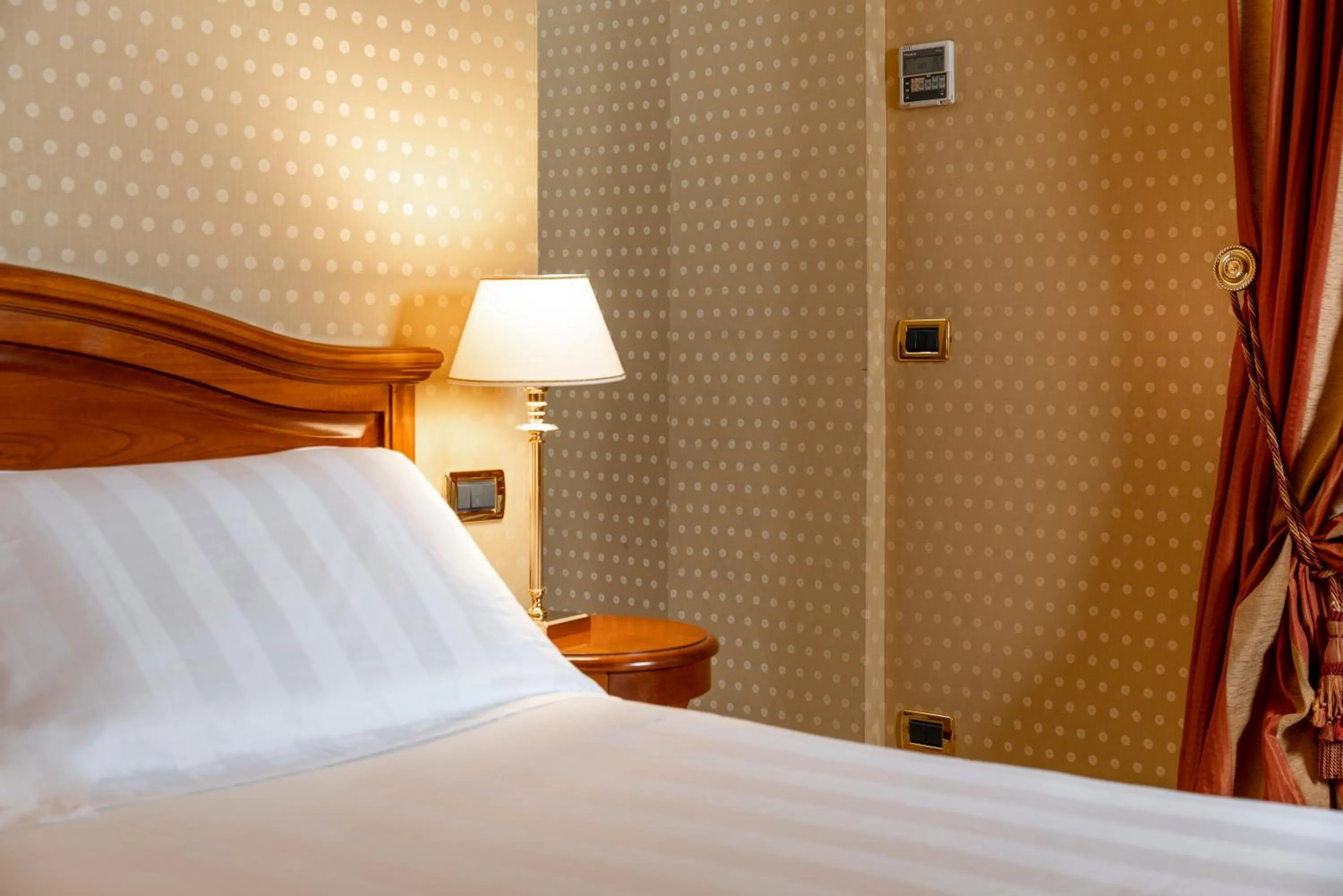 Bed in Hotel Oceania