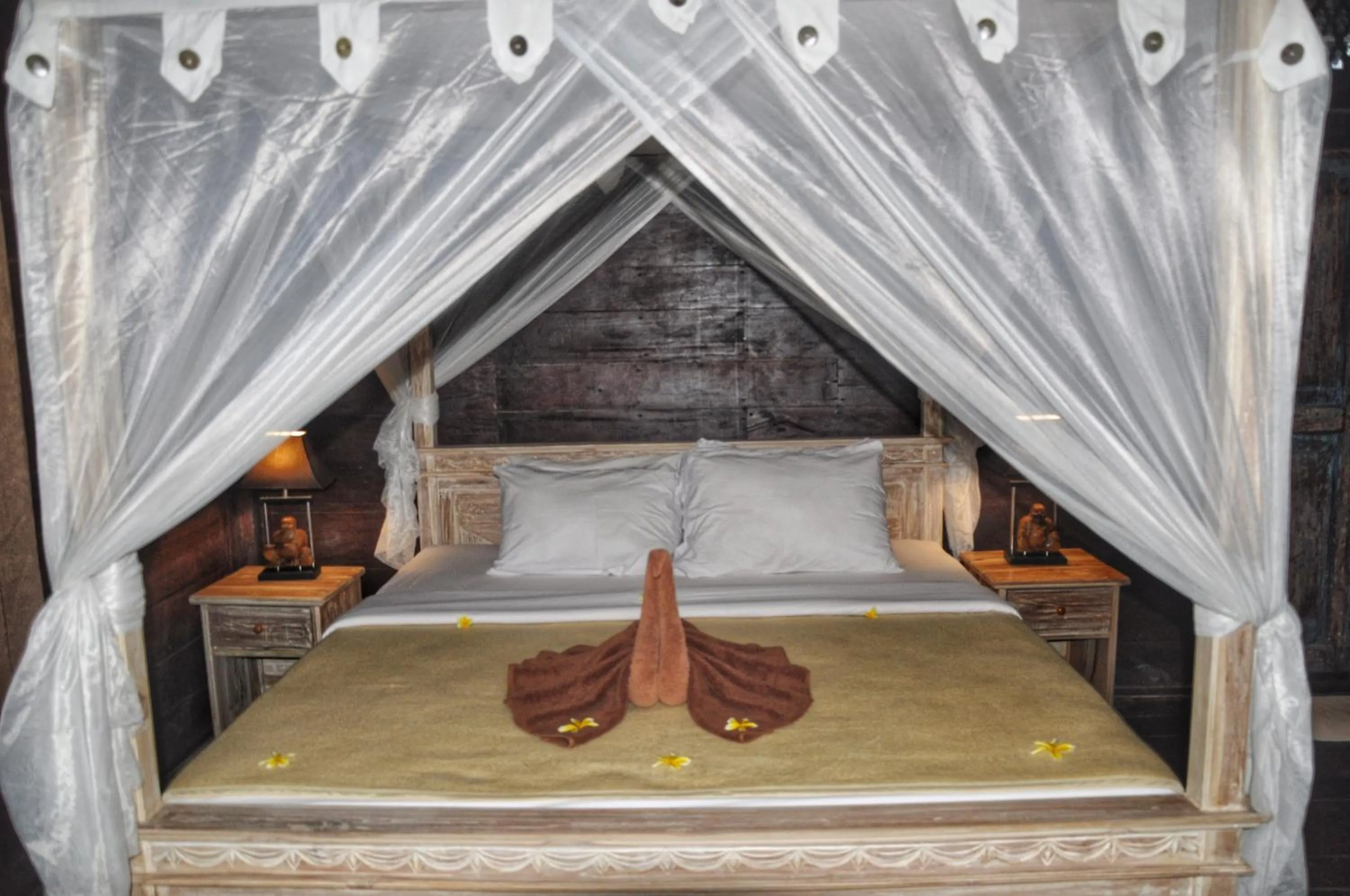Bed in Kubudiuma Villas Bali