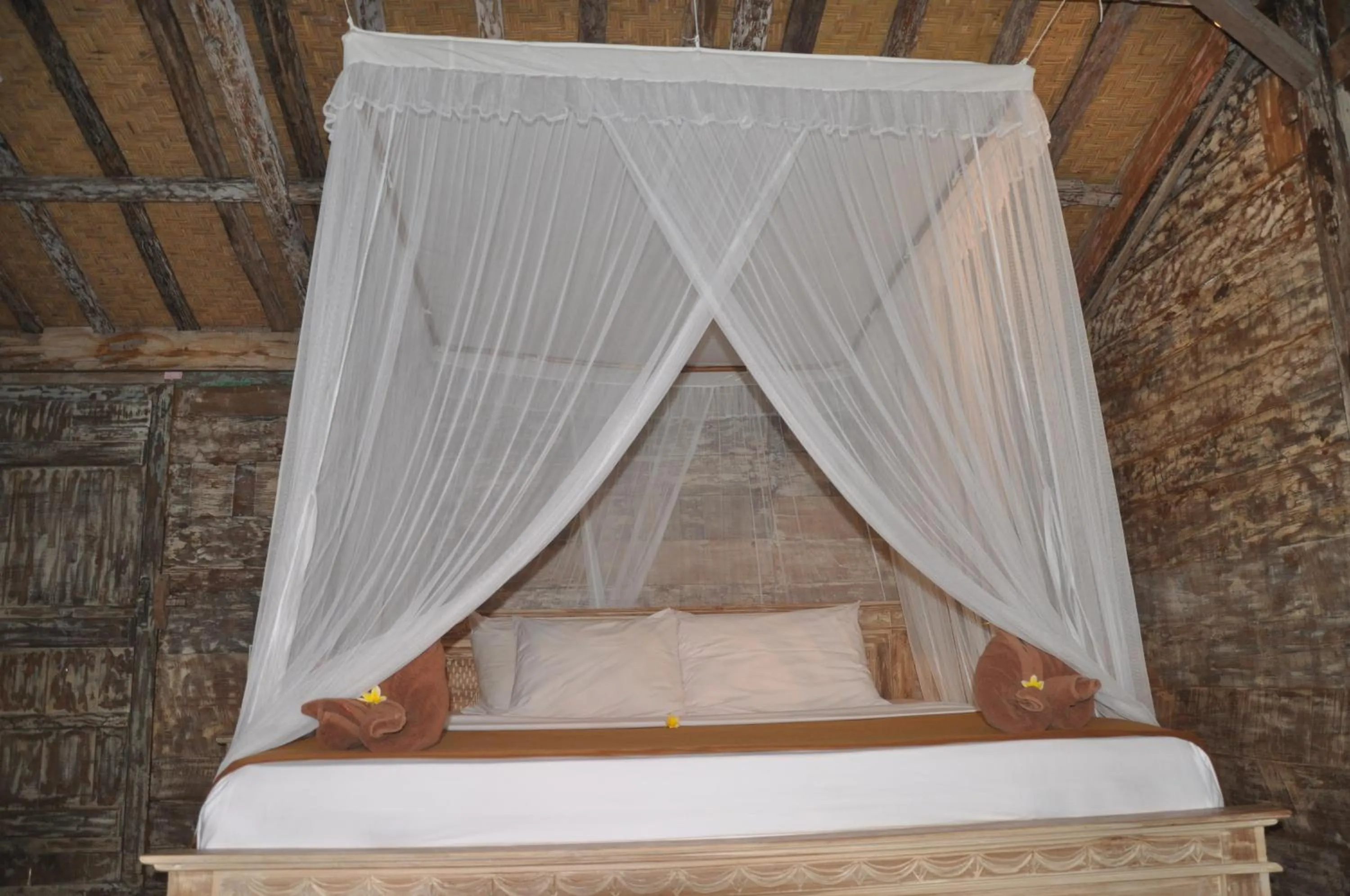 Bed in Kubudiuma Villas Bali