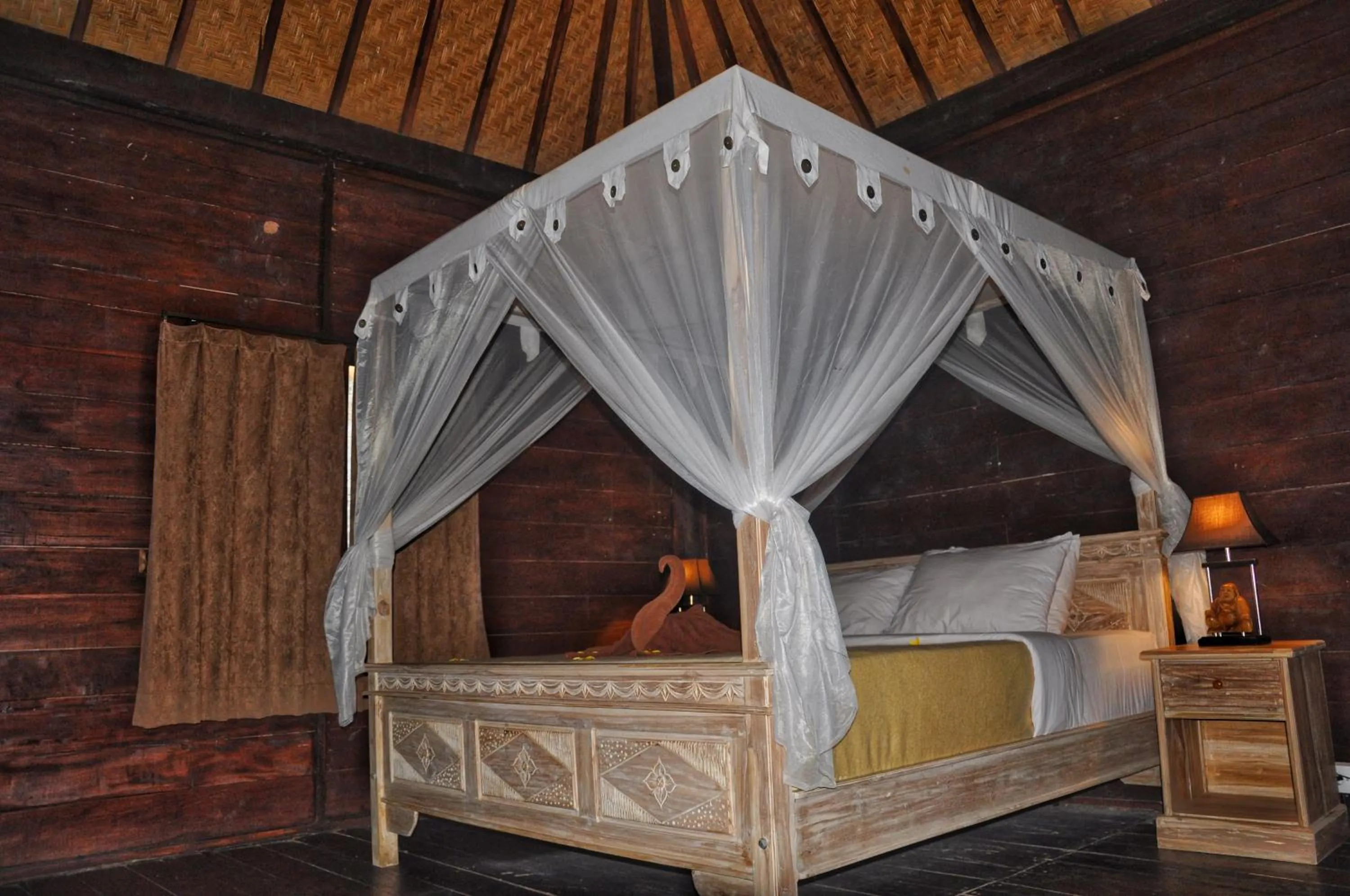 Bed in Kubudiuma Villas Bali