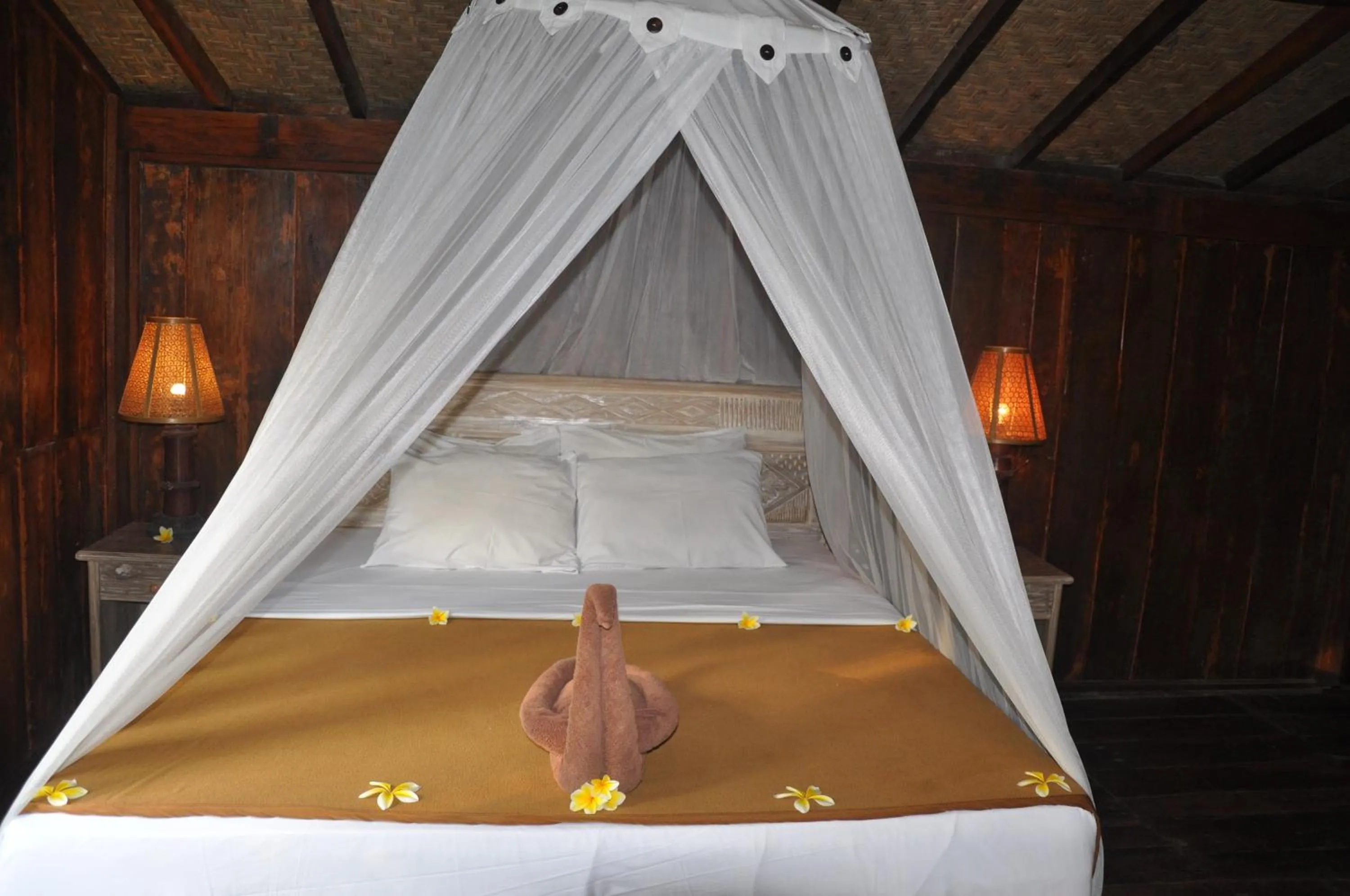 Bed in Kubudiuma Villas Bali