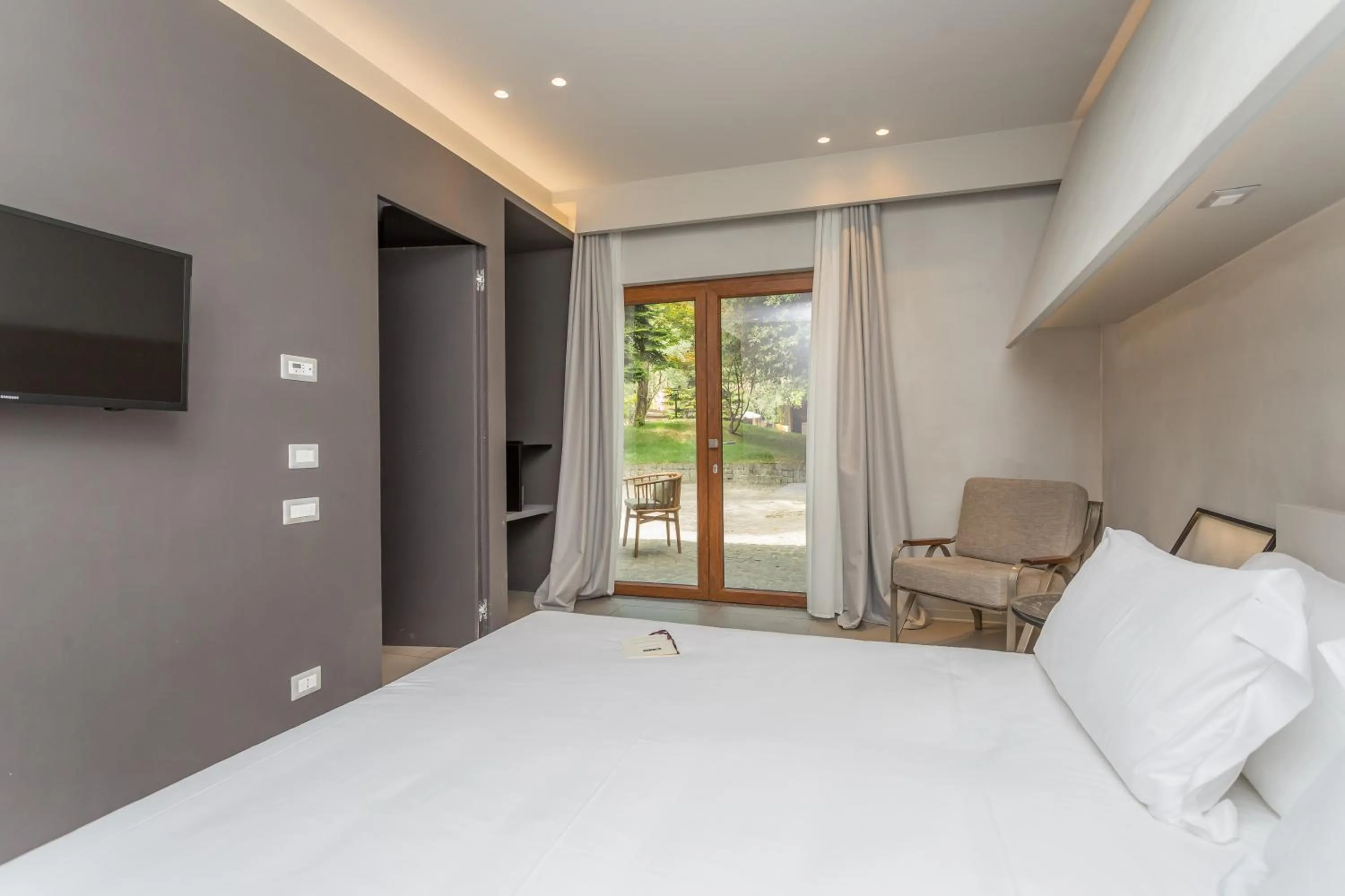 Photo of the whole room, Bed in Fauno Urban Resort