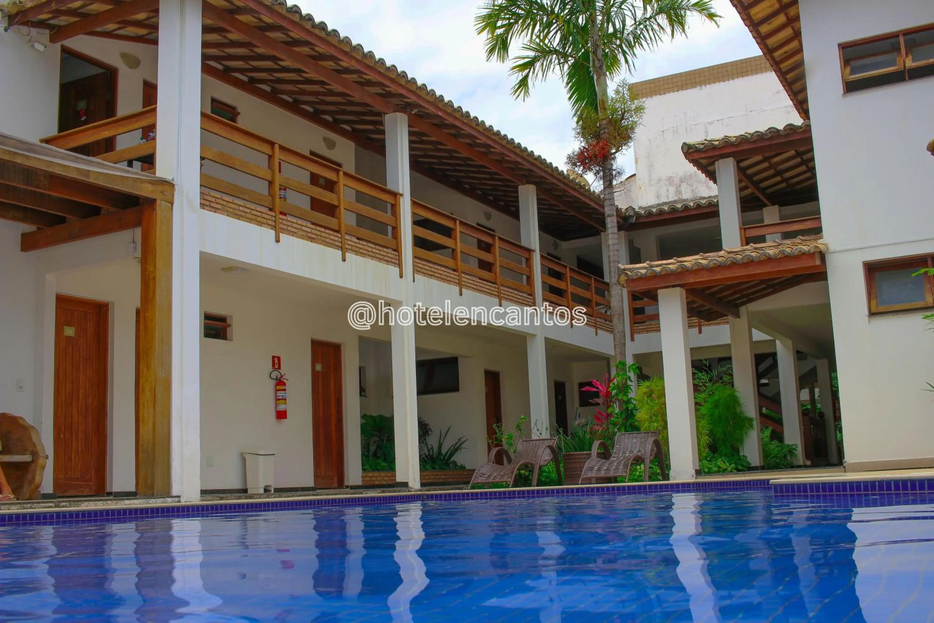 Swimming pool in Hotel Encantos de Itaperapuã