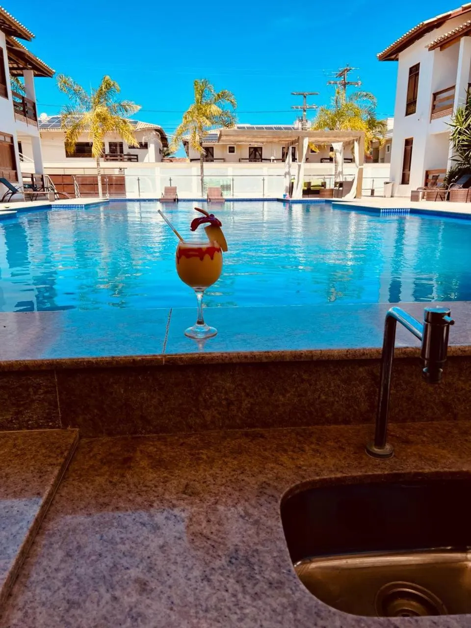 Property building in Hotel Encantos de Itaperapuã