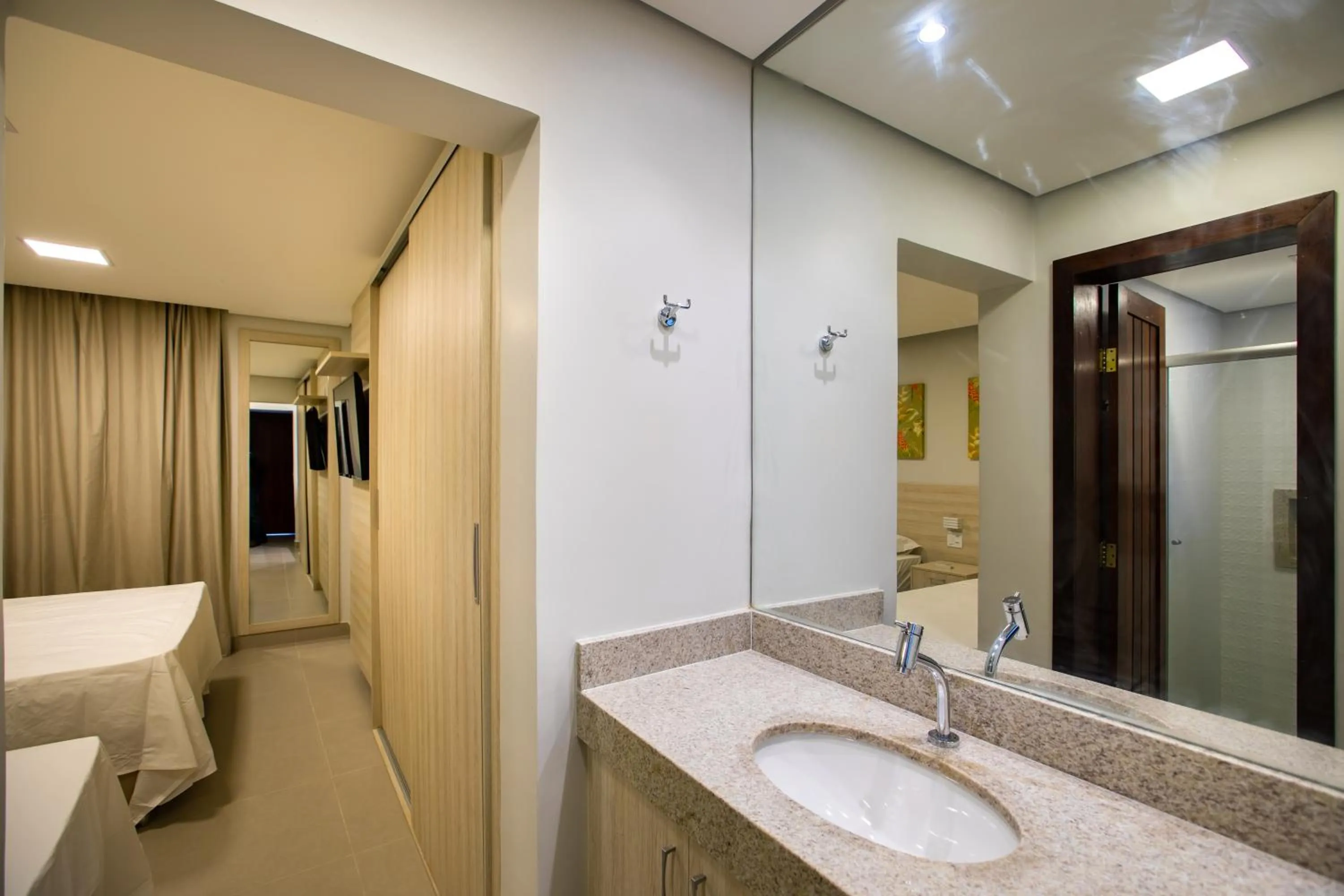 Bed in Hotel Encantos de Itaperapuã