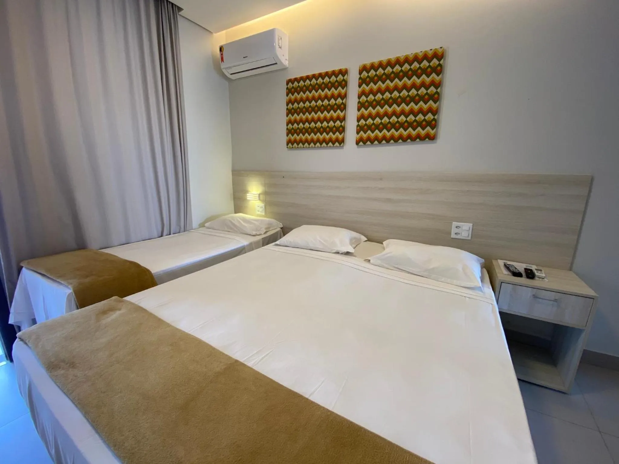 Bed in Hotel Encantos de Itaperapuã